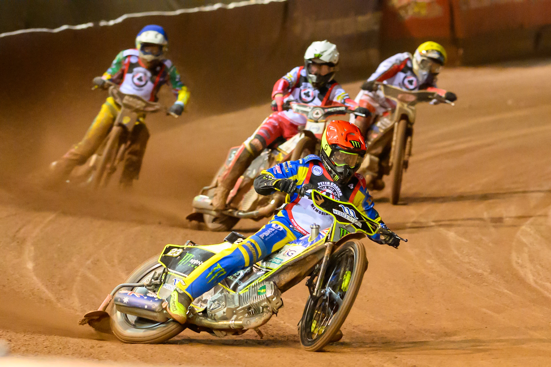 Chris Holder  in Red leading Dan Bewley in White, Jason Doyle  in Blue and Rasmus Jensen in Yellow during the Peter Craven Memorial Trophy at the National Speedway Stadium, Manchester, on Monday 16th March 2026. (Photo: Ian Charles | MI News)