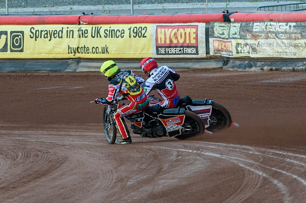 MANCHESTER, UK. JULY 29TH  Jack Parkinson-Blackburn (Red) passes Tom Spencer   (Yellow)  during the National Development League match between Belle Vue Colts and Leicester Lion Cubs at the National Speedway Stadium, Manchester on Thursday 29th July 2021. (Credit: Ian Charles | MI News)