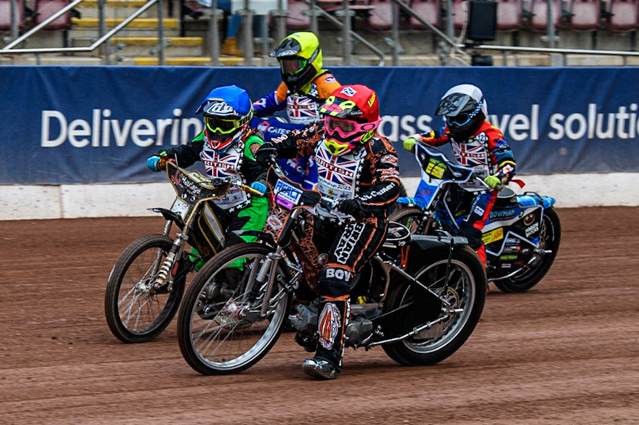 Liam Morris  (Red) inside Archie Whitlam (Blue) with Charlie Fletcher  (White) and Adam Sydyk  (Yellow) behind  during the British Youth Championships at the National Speedway Stadium, Manchester on Friday 12th May 2023. (Photo: Ian Charles | MI News)