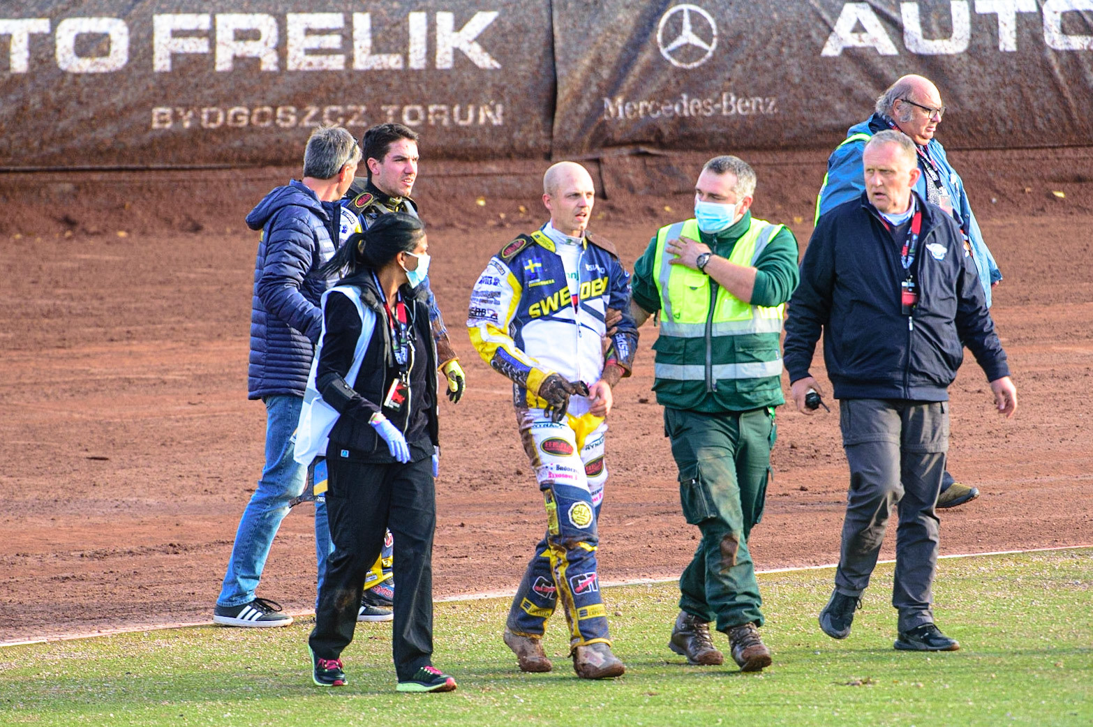 MANCHESTER, UK. OCT 16TH The Swedish riders walk off after their crash with the medical staff and members of their support team during the Monster Energy FIM Speedway of Nations at the National Speedway Stadium, Manchester on Saturday  16th October 2021. (Credit: Ian Charles | MI News)