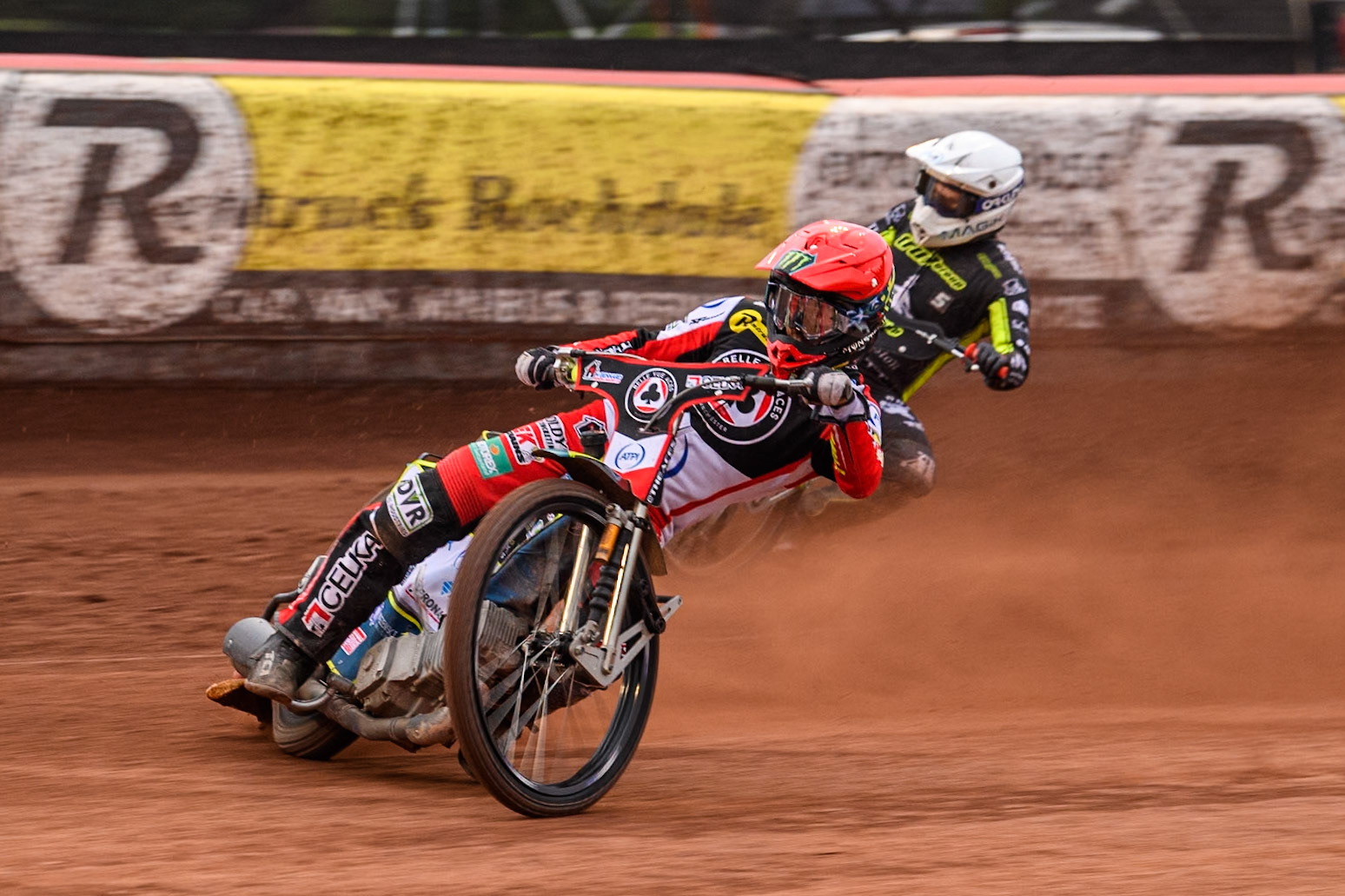 Belle Vue Aces' Jaimon Lidsey  in Red leading Ipswich Witches' Emil Sayfutdinov in White during the Rowe Motor Oil Premiership match between Belle Vue Aces and Ipswich Witches at the National Speedway Stadium, Manchester on Monday 1st July 2024. (Photo: Ian Charles | MI News)
