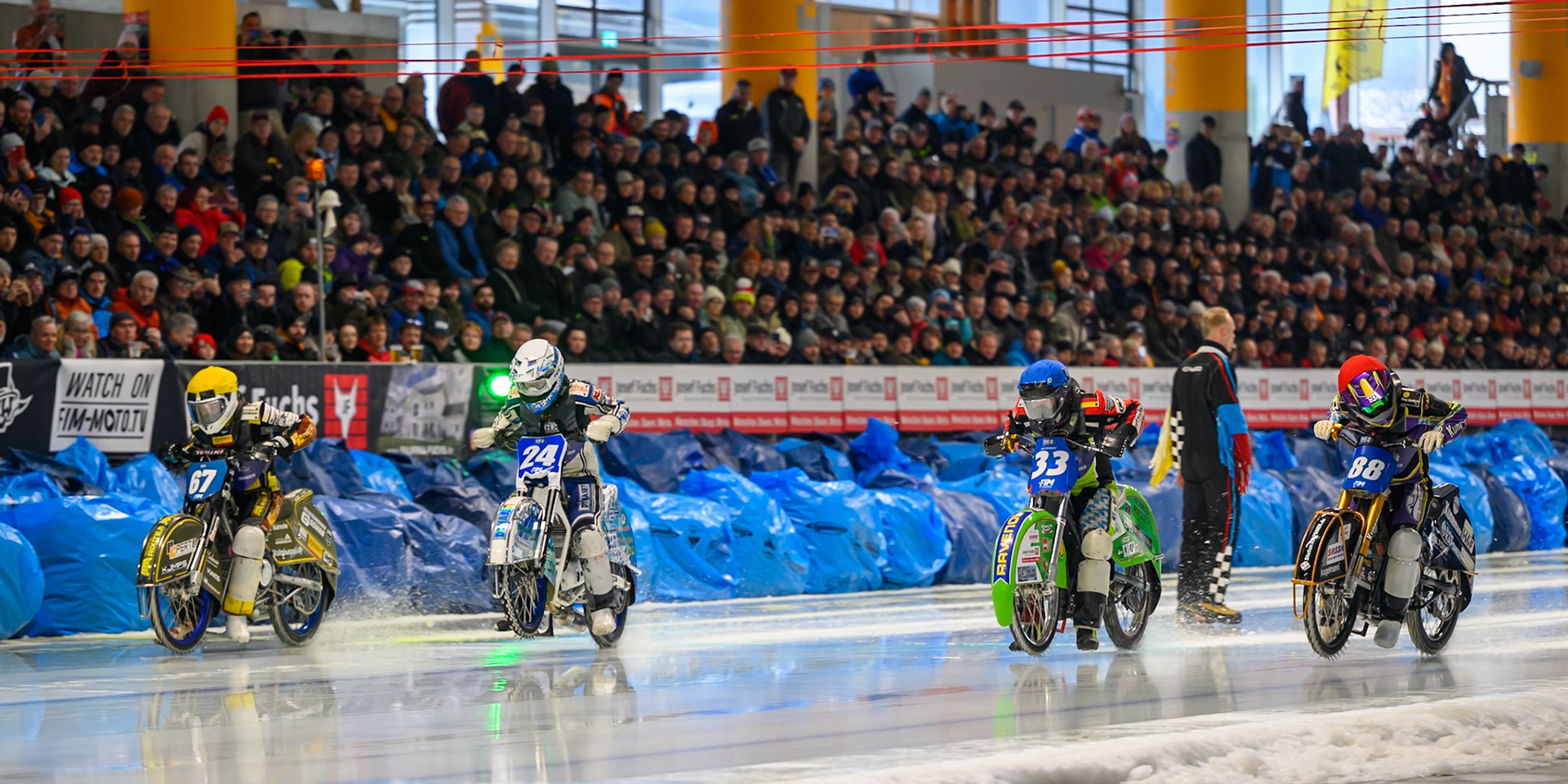 Heat 1 start: (L to R) Heikki Huusko (67) of Finland  in Yellow, Max Koivula (24) of Finland in White, Johann Weber (33) of Germany in Blue, Max Niedermaier (88) of Germany in Red during the Ice Speedway Gladiators World Championship Final 2 at Max-Aicher-Arena, Inzell on Sunday 15th March 2026. (Photo: Ian Charles | MI News)