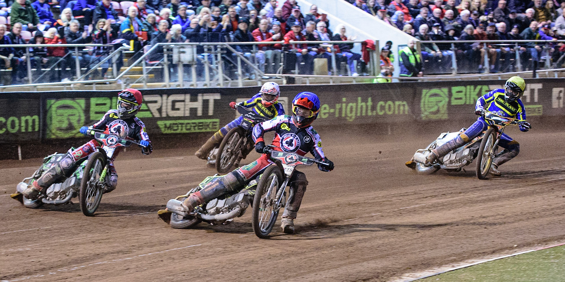 MANCHESTER, UK. OCT 7TH  Belle Vue BikeRight Aces  on maximum points as they try to win the meeting with Jye Etheridge   (Blue) and Charles Wright  (Red) ahead of Josh Pickering   (White) and Connor Mountain  (Yellow) during the SGB Premiership Play off Semi-Final Second Leg between Belle Vue Aces and Sheffield Tigers at the National Speedway Stadium, Manchester on Thursday 7th October 2021. (Credit: Ian Charles | MI News)