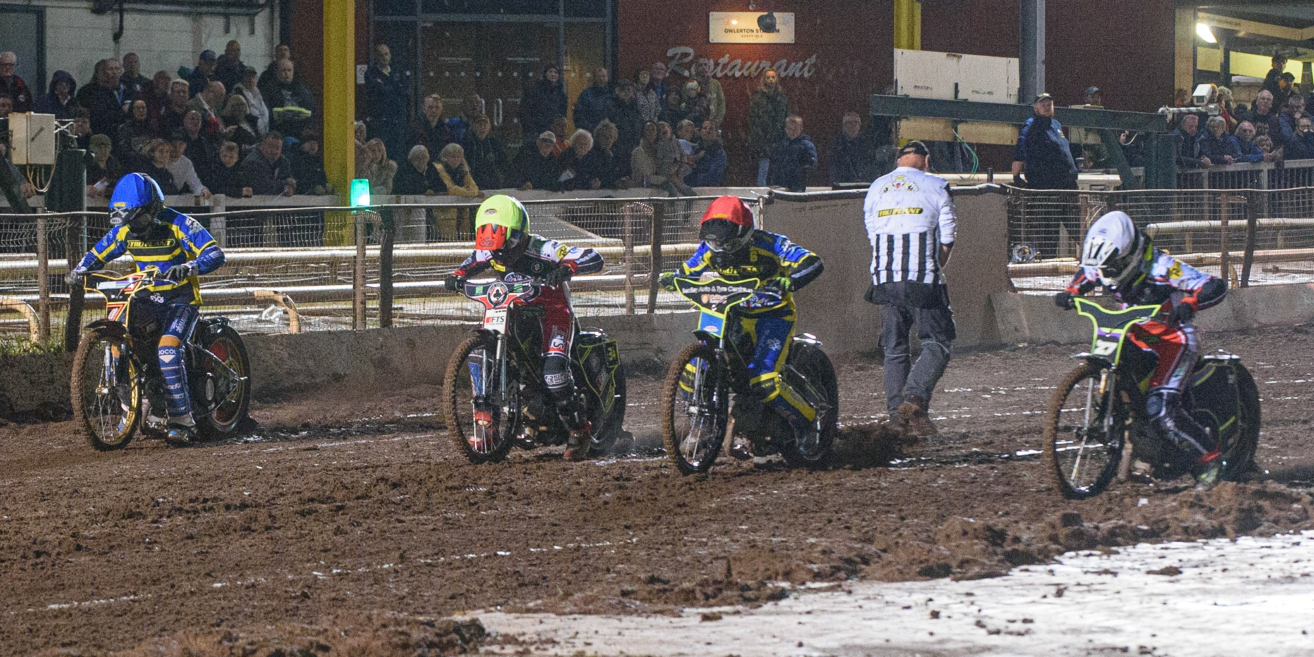 SHEFFIELD, UK. OCT 4TH(l-r) Connor Mountain  (Blue), Jye Etheridge  (Yellow), Danyon Hume (Red) and Tom Brennan  (White) leave the start during the SGB Premiership Semi Final Playoff 1st Leg between Sheffield Tigers and Belle Vue Aces at Owlerton Stadium, Sheffield on Monday 4th October 2021. (Credit: Ian Charles | MI News)