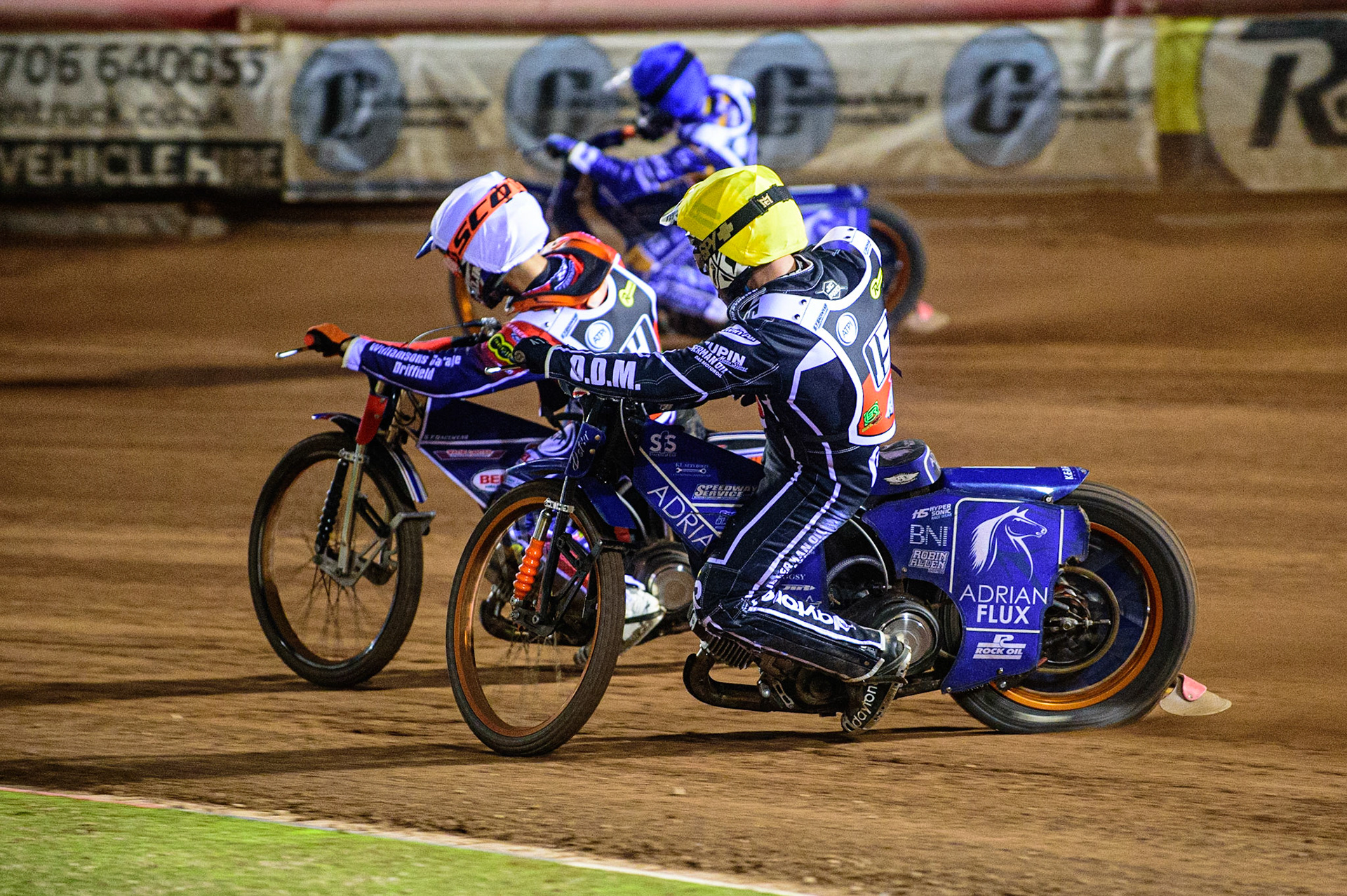 MANCHESTER, UK. OCT 23RD  Erik Riss  (Yellow) chases Jordan Palin  (White) and Lewis Kerr  (Blue) during the Peter Craven Memorial Trophy event at the National Speedway Stadium, Manchester on Saturday 23rd October 2021. (Credit: Ian Charles | MI News)