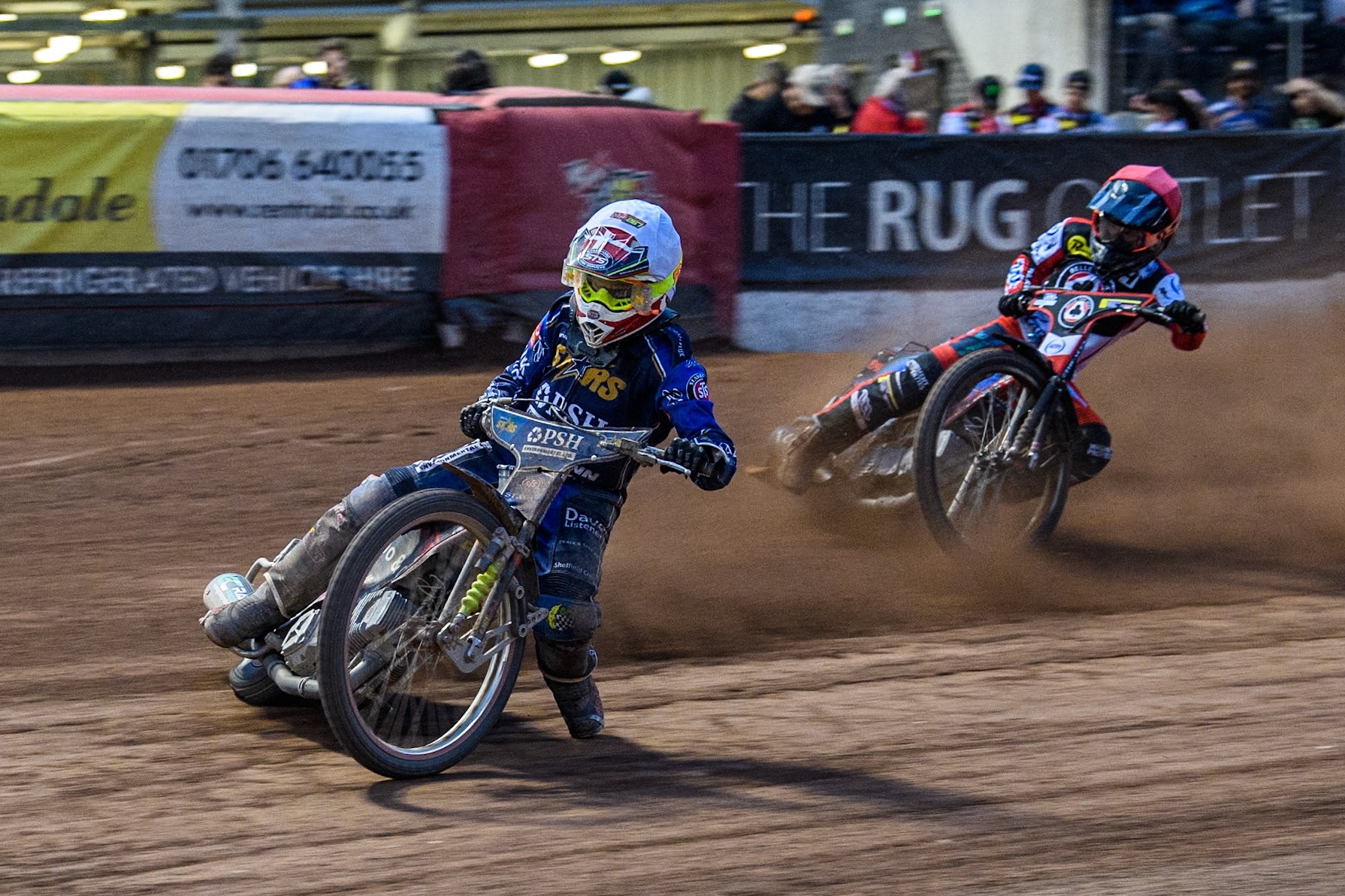 King Lynn Stars' Michael Palm Toft in White leading Belle Vue Aces' Ben Cook in Red during the Rowe Motor Oil Premiership match between Belle Vue Aces and King's Lynn Stars at the National Speedway Stadium, Manchester on Monday 20th May 2024. (Photo: Ian Charles | MI News)
