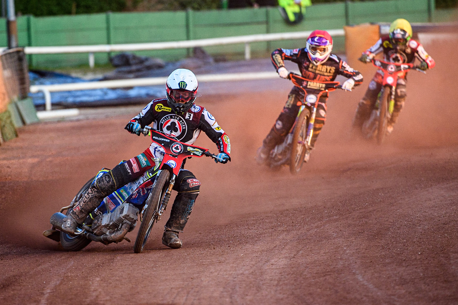 Jaimon Lidsey (White) leads Rory Schlein (Red) and Charles Wright (Yellow) during the Sports Insure Premiership match between Wolverhampton Wolves and Belle Vue Aces at Monmore Green Stadium, Wolverhampton on Monday 29th May 2023. (Photo: Ian Charles | MI News)