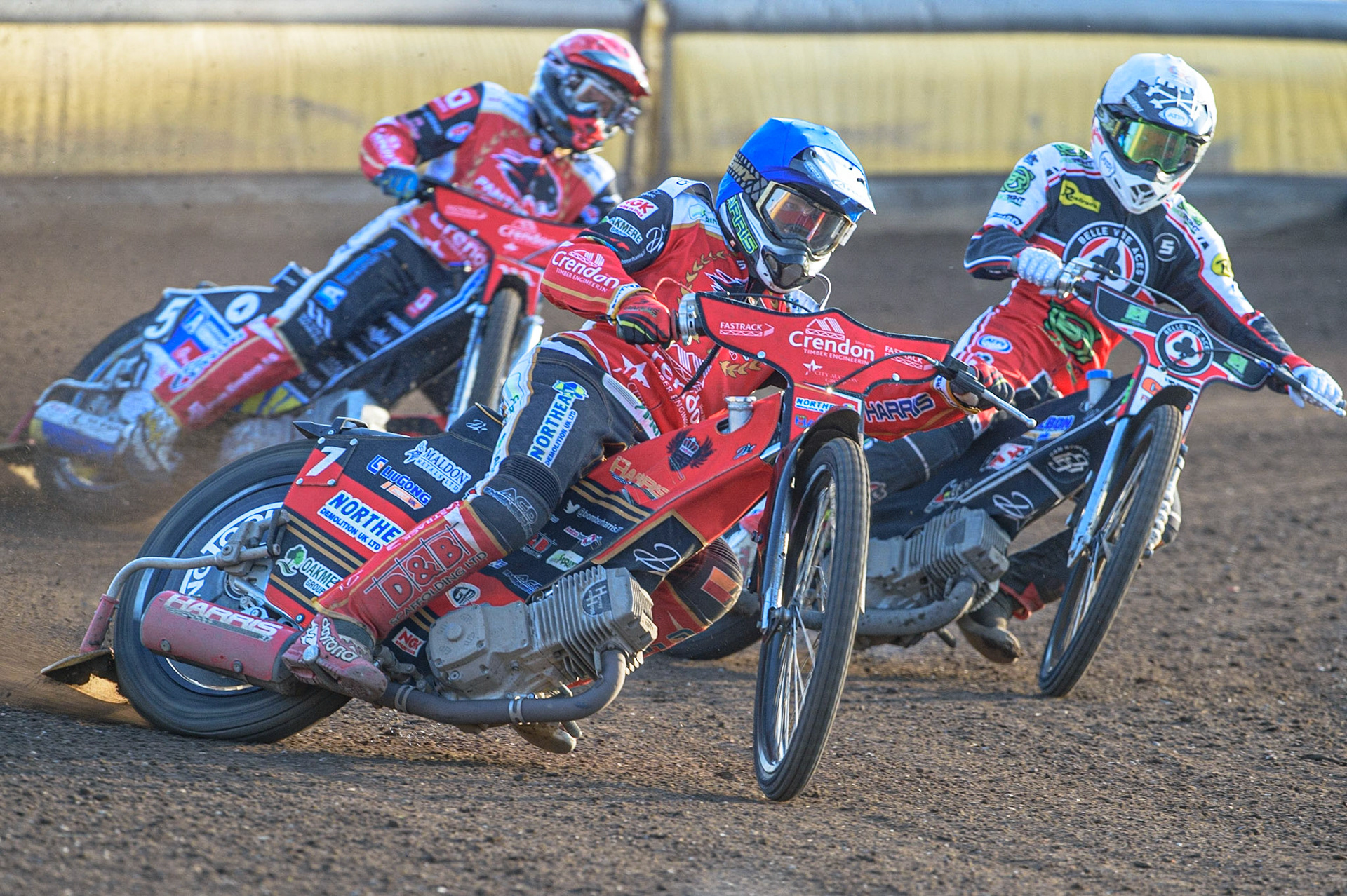 PETERBOROUGH, UK. JULY 19TH  Chris Harris (Blue) leads Bjarne Pedersen  (Red) and Dan Bewley  (White) during the SGB Premiership match between Peterborough and Belle Vue Aces at East of England Showground, Peterborough on Monday 19th July 2021. (Credit: Ian Charles | MI News)