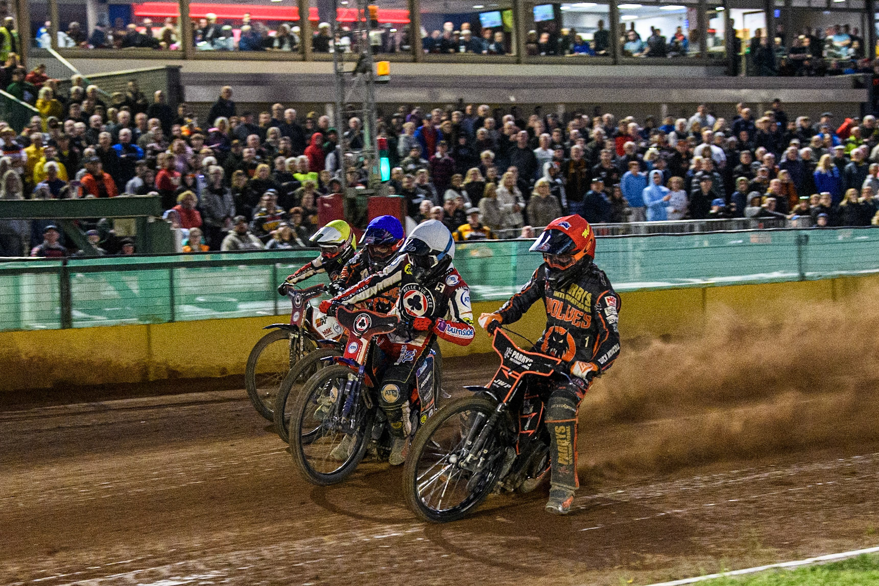 Sam Masters (Red) inside Brady Kurtz (White), Steve Worrall (Blue) and Dan Bewley (Yellow) during the Sports Insure Premiership match between Wolverhampton Wolves and Belle Vue Aces at Monmore Green Stadium, Wolverhampton on Monday 29th May 2023. (Photo: Ian Charles | MI News)