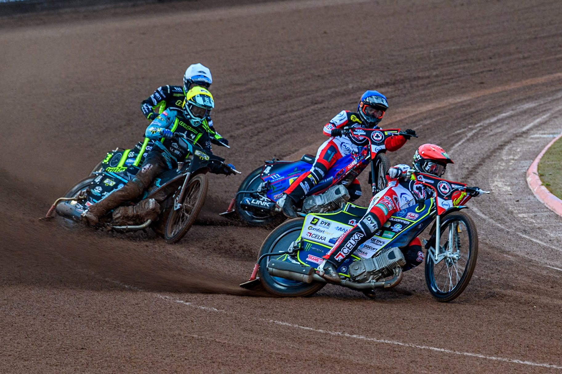 Belle Vue Aces' Jaimon Lidsey in Red leading Belle Vue Aces' Ben Cook in Blue, Ipswich Witches' Guest Ryan Douglas in Yellow and Ipswich Witches' Adam Ellis in White during the Rowe Motor Oil Premiership match between Belle Vue Aces and Ipswich Witches at the National Speedway Stadium, Manchester on Monday 22nd April 2024. (Photo: Ian Charles | MI News)