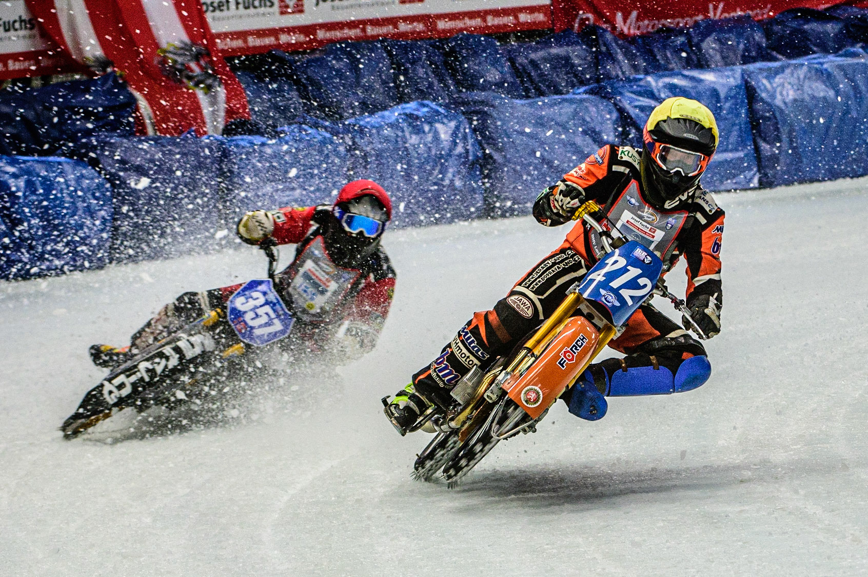 Lukas Hutla (212) (Yellow) picks up ahead of Jo Saetre (357)(Red) during the Ice Speedway Gladiators World Championship Final 1 at Max-Aicher-Arena, Inzell, Germany on Saturday 18th March 2023. (Photo: Ian Charles | MI News)