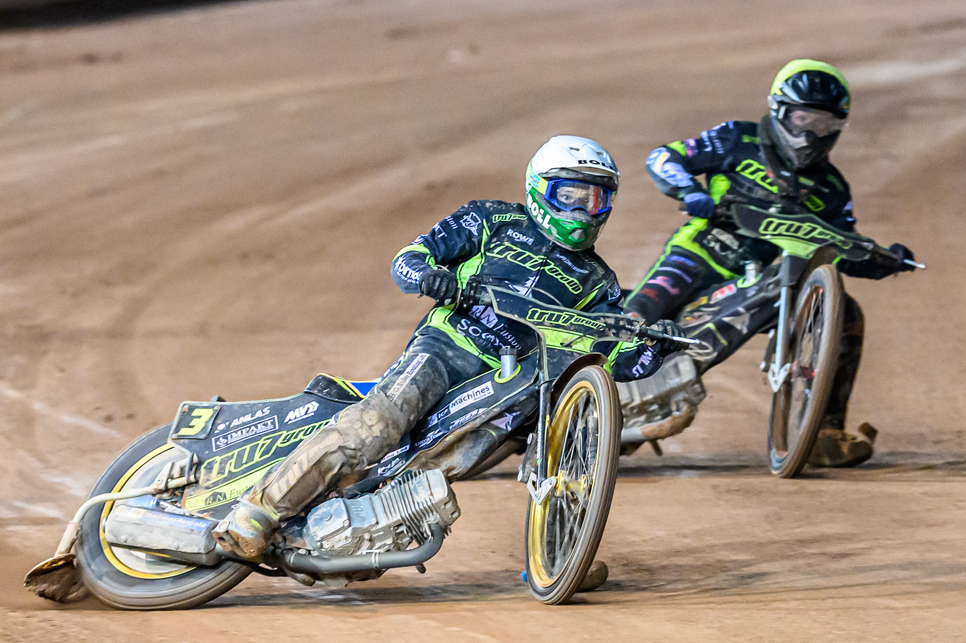 Jason Doyle of Ipswich Witches  in White leading team mate Dan Thompson in White  during the Rowe Motor Oil Premiership Play Off Semi Final 1 (1st Leg)  between Belle Vue Aces and Ipswich Witches at the National Speedway Stadium, Manchester on Monday 8th September 2025. (Photo: Ian Charles | MI News)