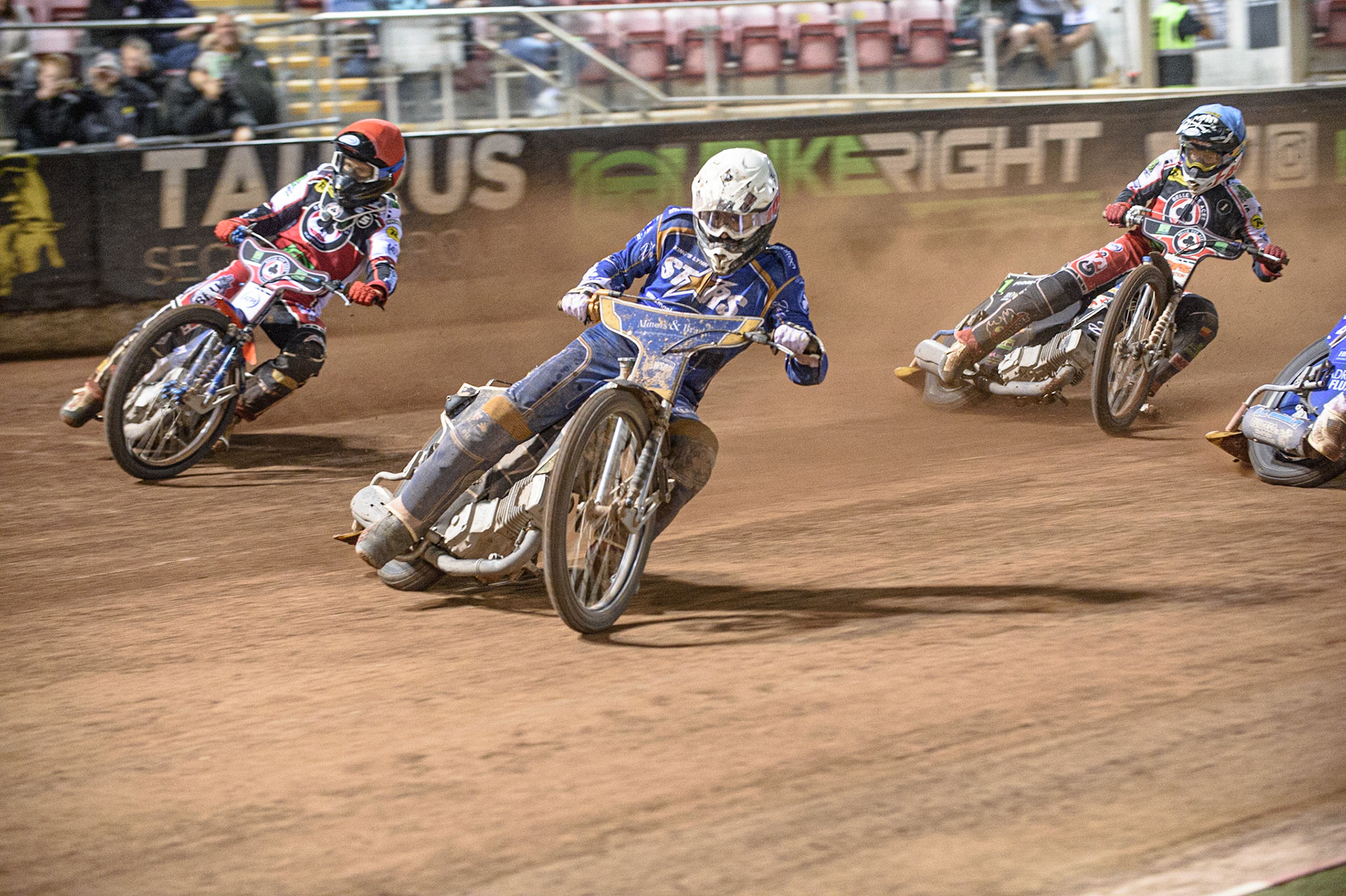 MANCHESTER, UK. AUGUST 23RD    Richard Lawson  (White) leads Brady Kurtz   (Red) and Dan Bewley   (Blue) during the SGB Premiership match between Belle Vue Aces and King's Lynn Stars at the National Speedway Stadium, Manchester on Monday 23rd August 2021. (Credit: Ian Charles | MI News)