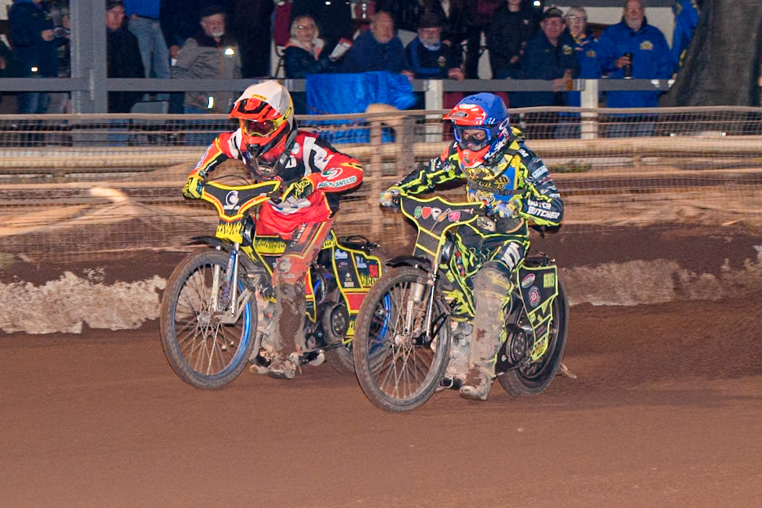 Sheffield Tiger Cubs' Ace Pijper  in Blue rides inside Belle Vue Colts' Guest Rider Max James  in White during the WSRA National Development League match between Sheffield Tiger Cubs and Belle Vue Colts at Owlerton Stadium, Sheffield on Thursday 12th September 2024. (Photo: Ian Charles | MI News)