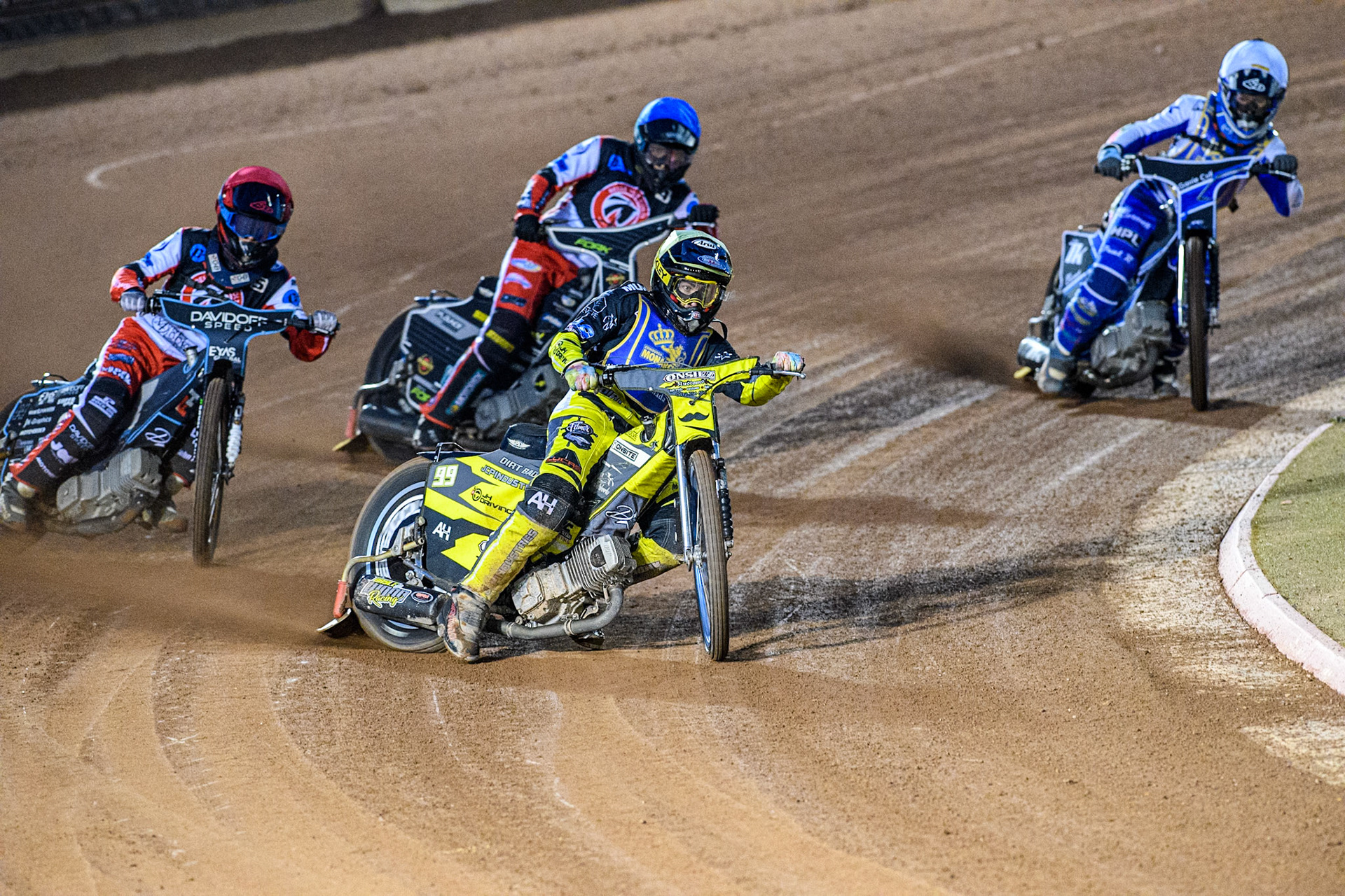 Edinburgh Monarchs' Dayle Wood in Yellow leading Belle Vue Colts' Freddy Hodder in Red Belle Vue Colts' Matt Marson in Blue and Edinburgh Monarchs' Sam McGurk in White during the WSRA National Development League match between Belle Vue Aces and Edinburgh Monarchs at the National Speedway Stadium, Manchester on Friday 30th August 2024. (Photo: Ian Charles | MI News)