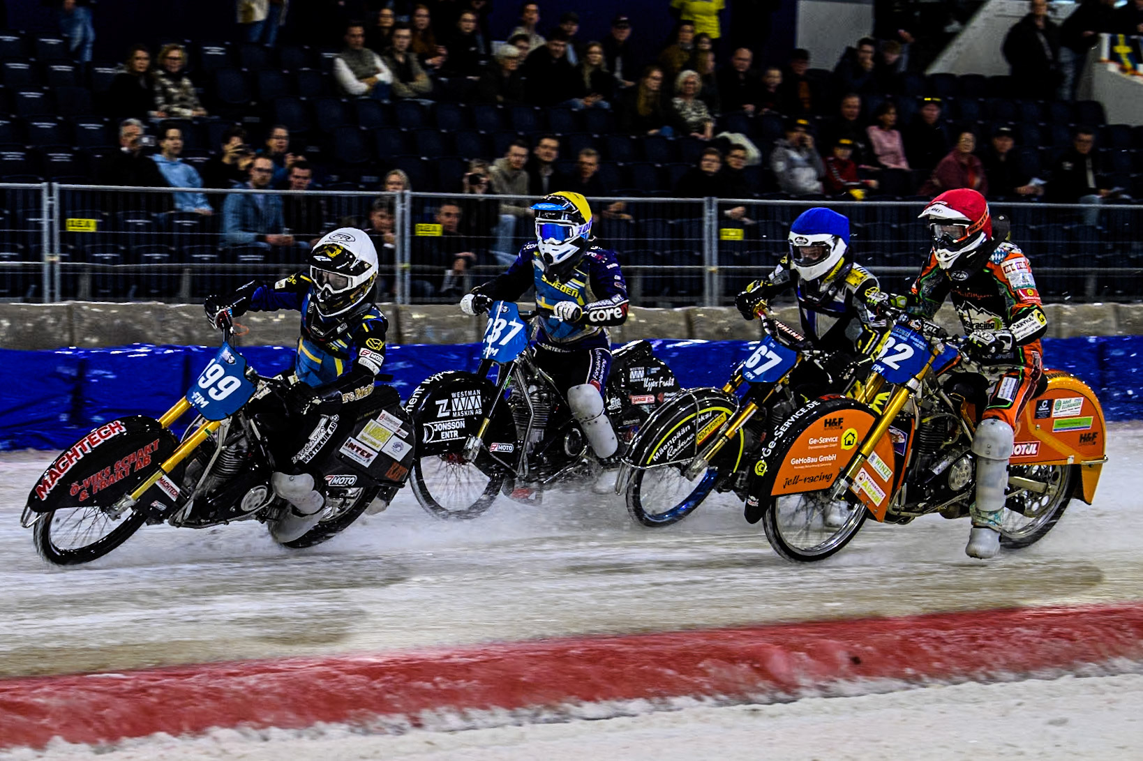 Sweden's Martin Haarahiltunen (199)  in White leading Germany's Markus Jell (82) in Red, Finland's Heikki Huusko (67) in Blue and Sweden's Jimmy Hörnell Lidfalk (237) in Yellow during the FIM Ice Speedway Gladiators World Championship Final 4 at Ice Rink Thialf, Heerenveen on Sunday 7th April 2024. (Photo: Ian Charles | MI News)