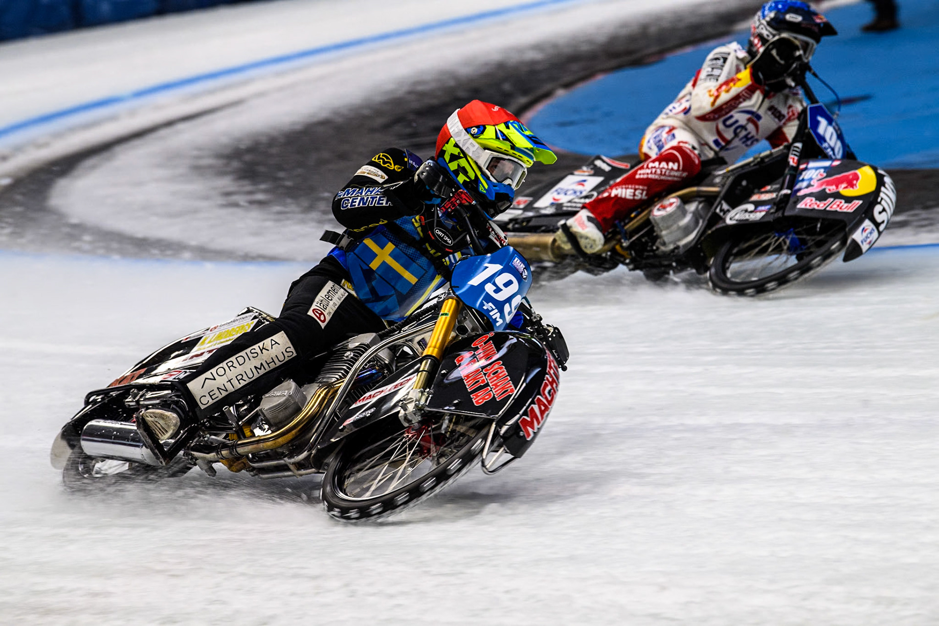 Sweden's Martin Haarahiltunen (199)  (Red) outside Austria's Franz Zorn (100) (Blue) during the FIM Ice Speedway Gladiators World Championship Final 2 at the Max-Aicher-Arena, Inzell on Sunday 24 March 2024. (Photo: Ian Charles | MI News)