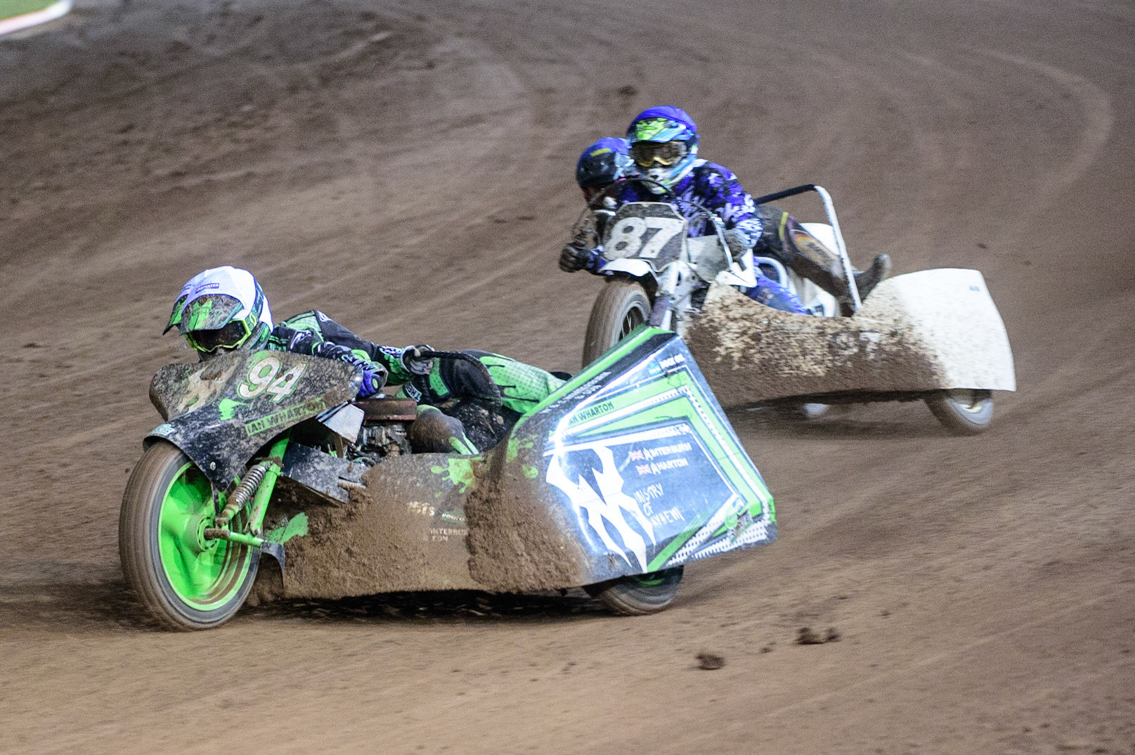 MANCHESTER, UK. OCT 30TH   Billy Winterburn &amp; Ryan Wharton  (White) leads Rob Bradley &amp; Darren Wilce  (Blue) during the Manchester Masters Sidecar Speedway and Flat Track Racing at the National Speedway Stadium, Manchester on Saturday 30th October 2021. (Credit: Ian Charles | MI News)