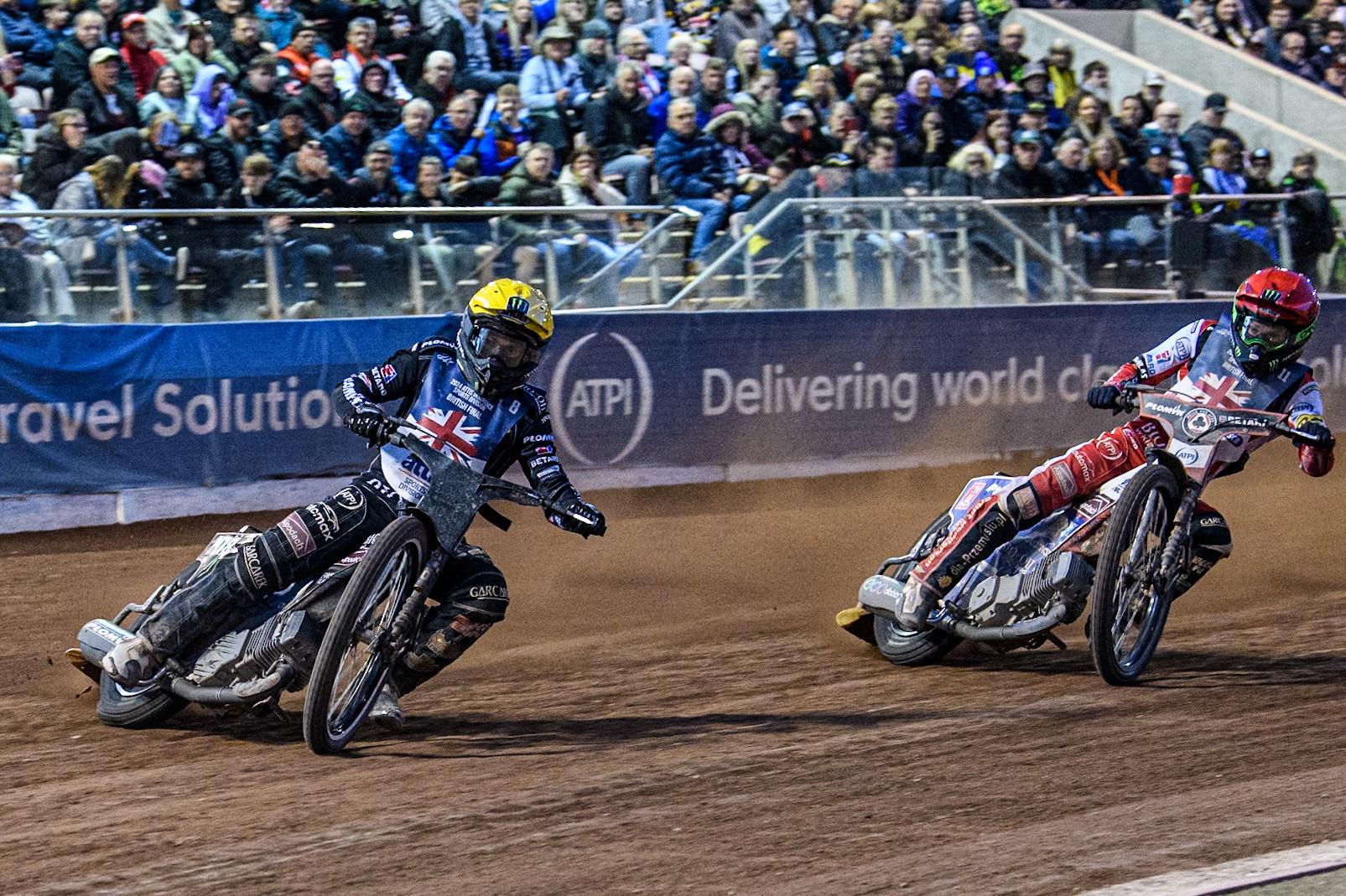 Tai Woffinden in Yellow leading Dan Bewley in the final during the Attis Insurance Sports Division British Speedway Championship Final at the National Speedway Stadium, Manchester on Saturday 8th June 2024. (Photo: Ian Charles | MI News)