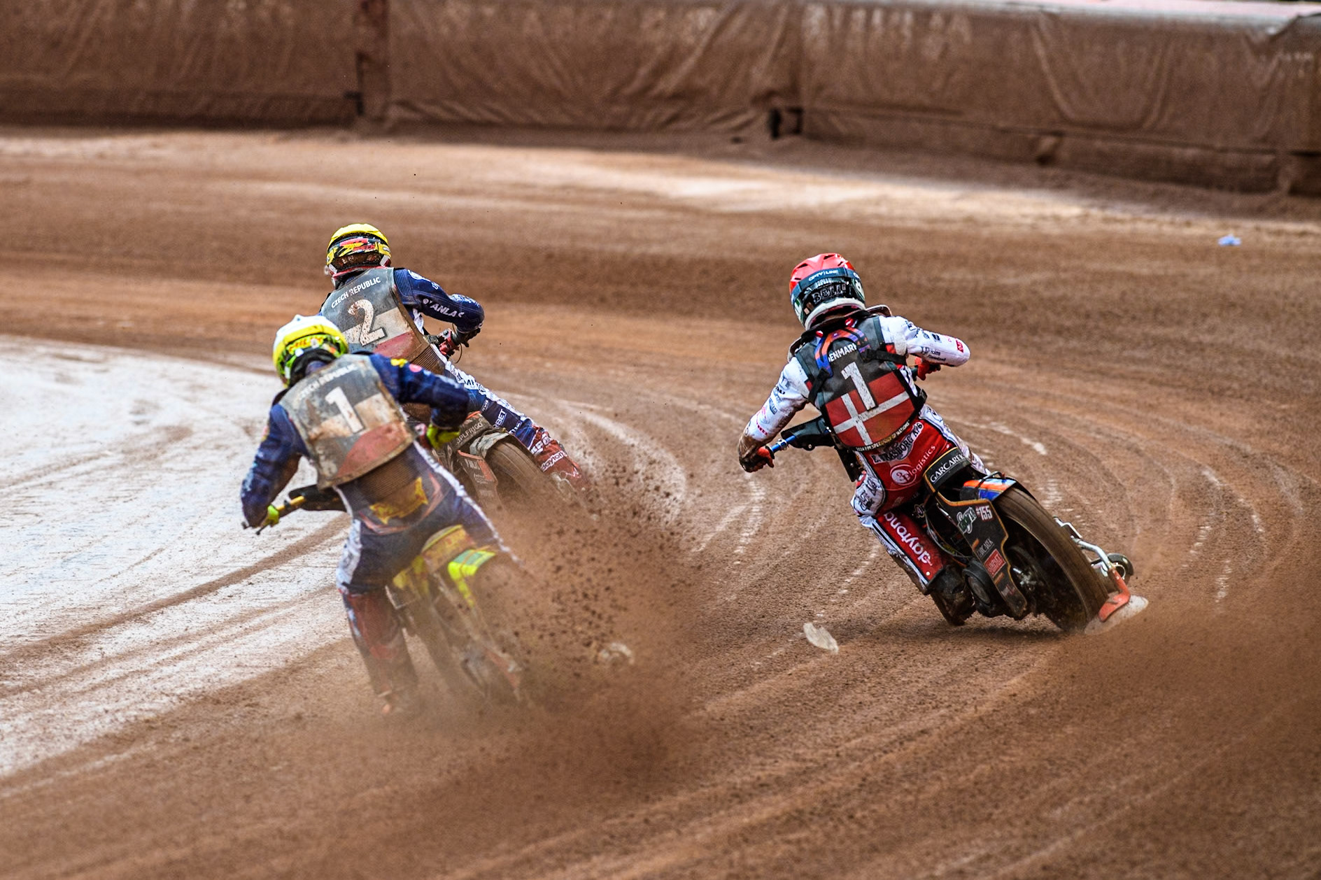 Vaclav Milik of The Czech Republic iin White chases Mikkel Michelsen of Denmark in Red and Jan Kvech of The Czech Republic in Yellowduring the Monster Energy FIM Speedway of Nation Semi Final 2 at the National Speedway Stadium, Manchester on Wednesday 10th July 2024. (Photo: Ian Charles | MI News)