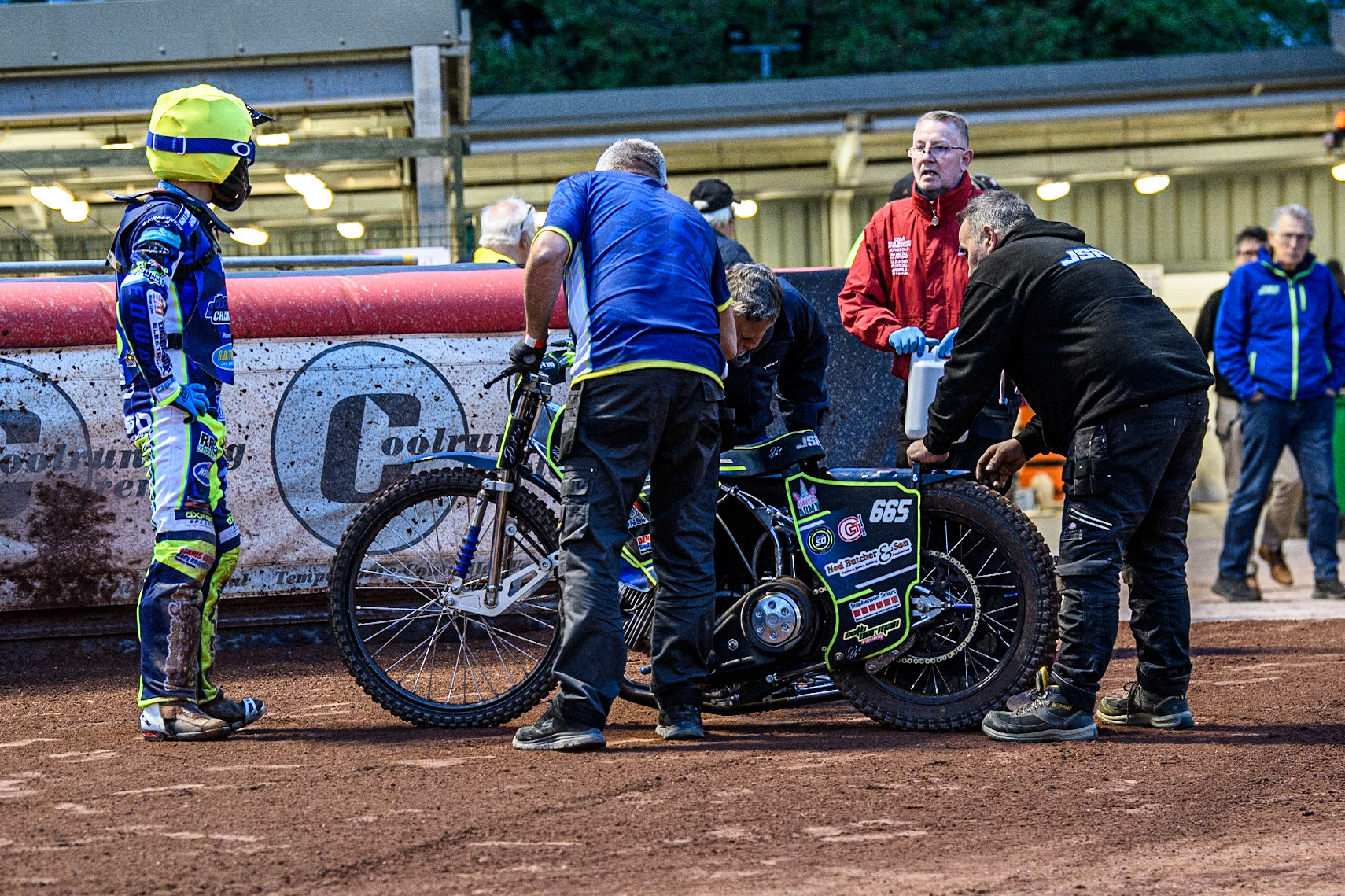 Mechanics work on Jody Scott’s bike as it fails before his next heat during the National Development League match between Belle Vue Colts and Oxford Chargers at the National Speedway Stadium, Manchester on Friday 12th May 2023. (Photo: Ian Charles | MI News)