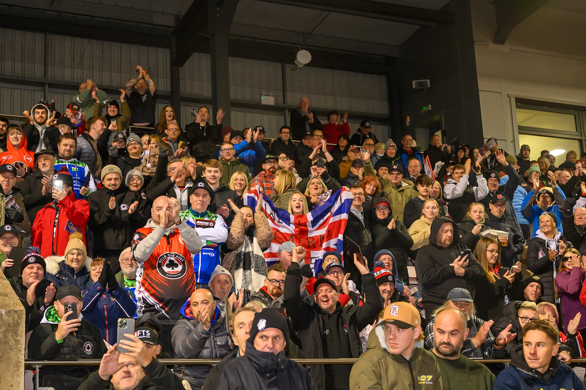 Aces fans celebrate during the Rowe Motor Oil Premiership Grand Final 2nd Leg between Belle Vue Aces and Sheffield Tigers at the National Speedway Stadium, Manchester on Friday 16th October 2026. (Photo: Ian Charles | MI News)