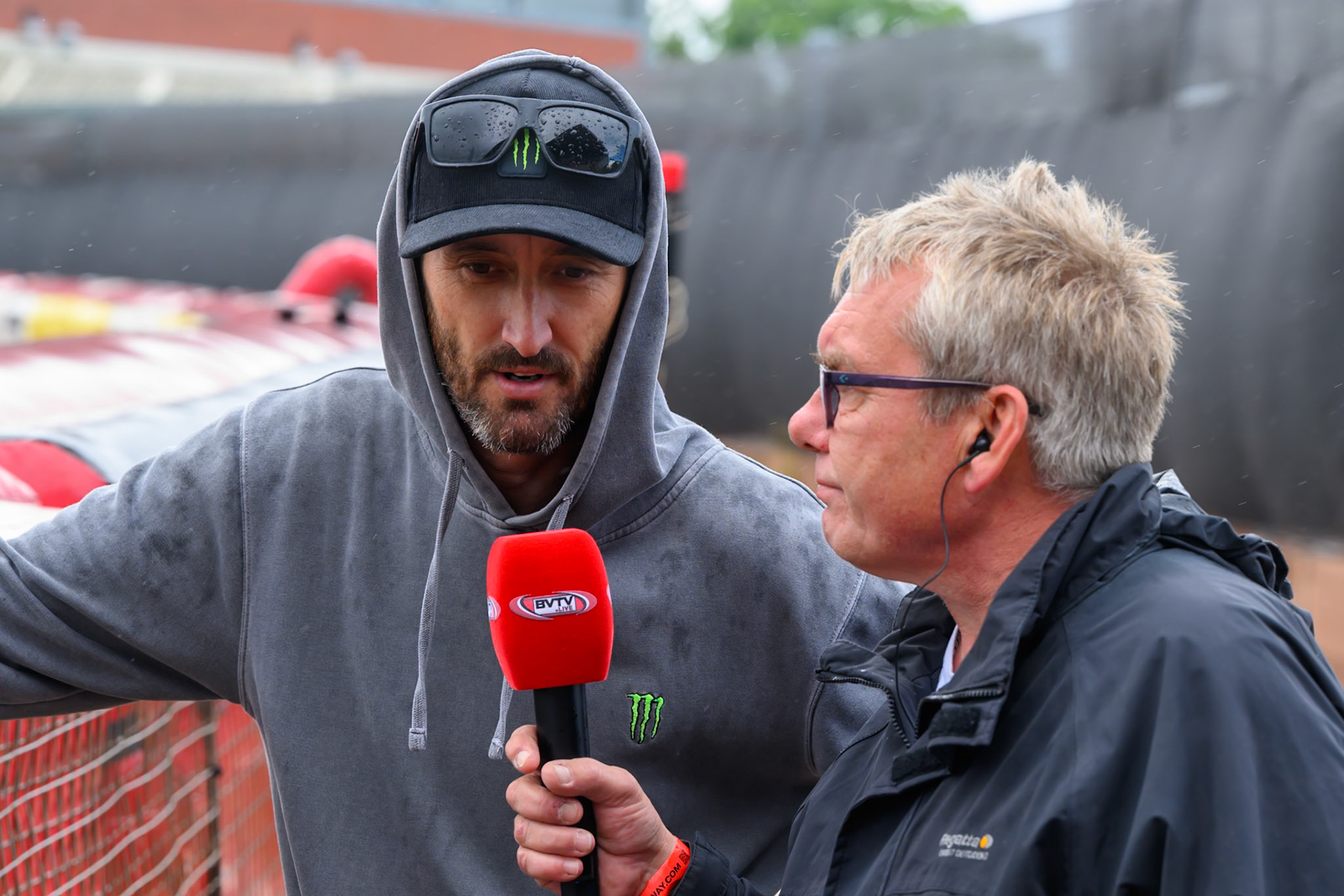 Chris Holder of Sheffield Tigers (Left)  gives BVTV Reporter Carl Stonehewer his views on the track before the rain off during the Rowe Motor Oil Premiership match between Belle Vue Aces and Sheffield Tigers at the National Speedway Stadium, Manchester on Monday 31st August 2026. (Photo: Ian Charles | MI News)