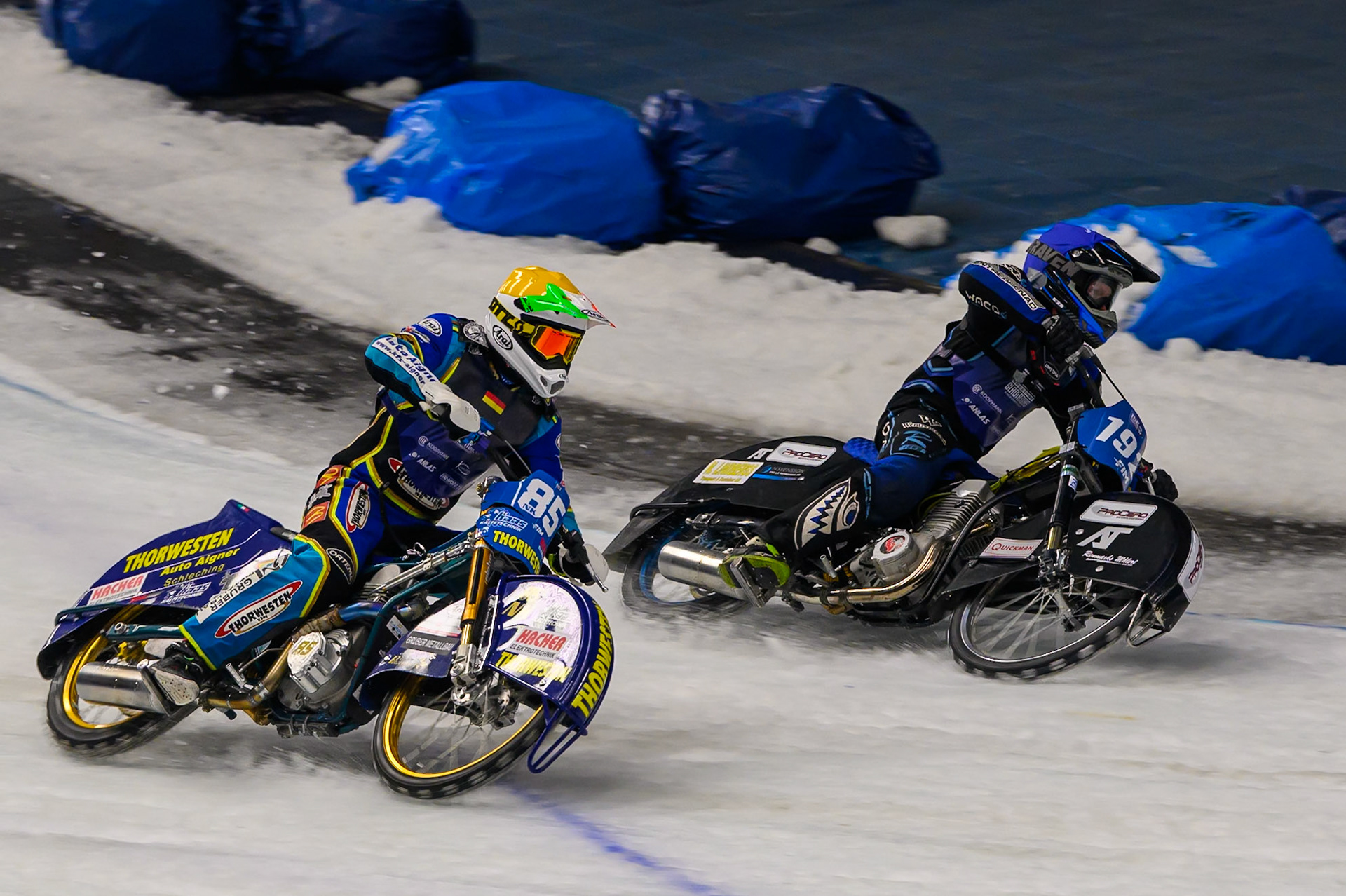 Sunday's Final Re-Run: Niclas Svensson (192) of Sweden in Blue leading Luca Bauer (85) of Italy/Germany  in Yellow during the Ice Speedway Gladiators World Championship Final 2 at Max-Aicher-Arena, Inzell on Sunday 15th March 2026. (Photo: Ian Charles | MI News)
