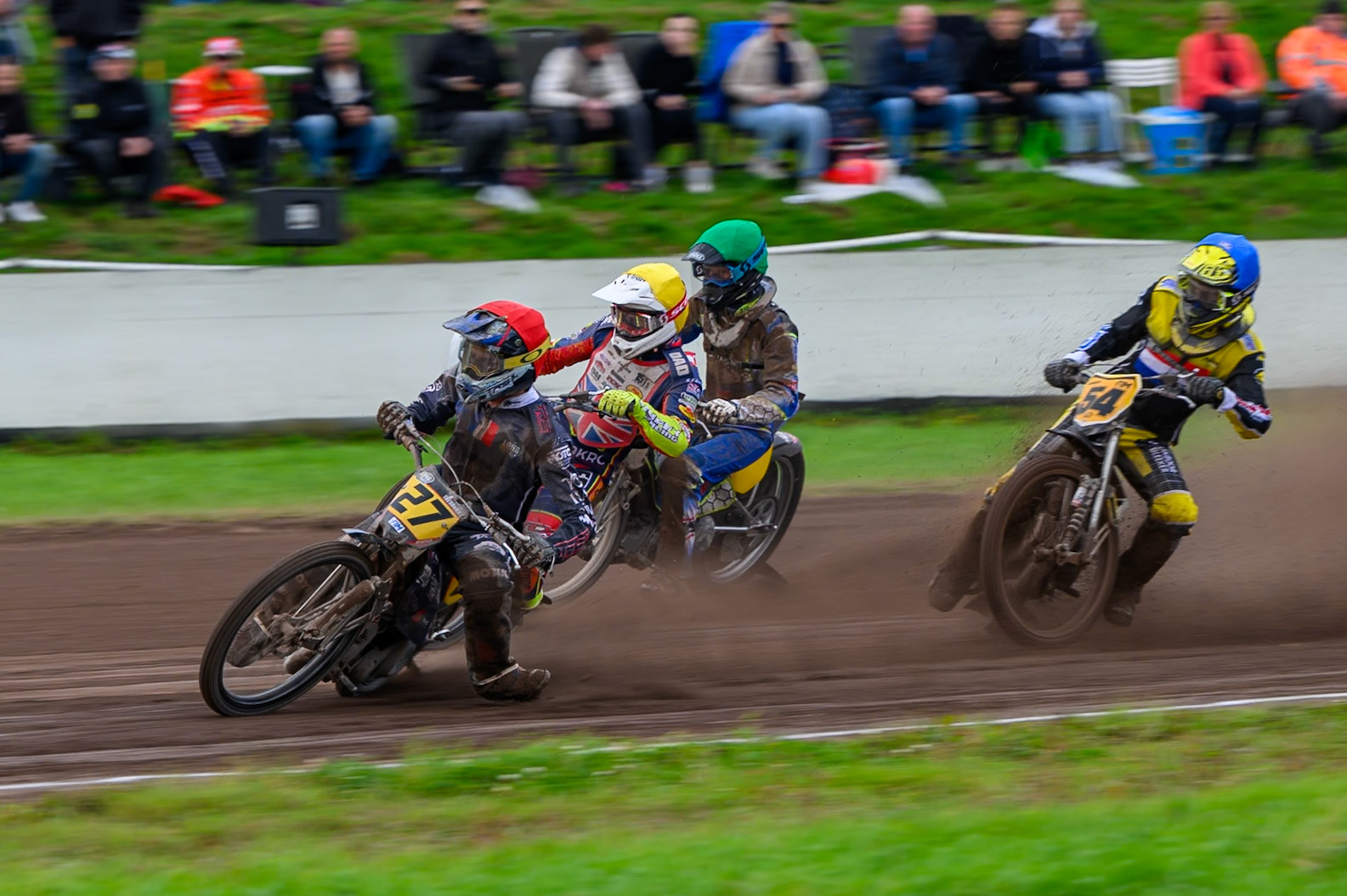 Mathias Trésarrieu (27) of France in Red leading Mika Meijer (54) of The Netherlands in Blue, Jake Mulford (72) of Great Britain in Yellow and William Kruit (19) of The Netherlands in Green during the FIM Long Track World Championship Final 4, at the Speed Centre Roden, Netherlands on Sunday 21st September 2025. (Photo: Ian Charles | MI News)during the FIM Long Track World Championship Final 4, at the Speed Centre, Roden on Sunday 21st September 2025. (Photo: Ian Charles | MI News)