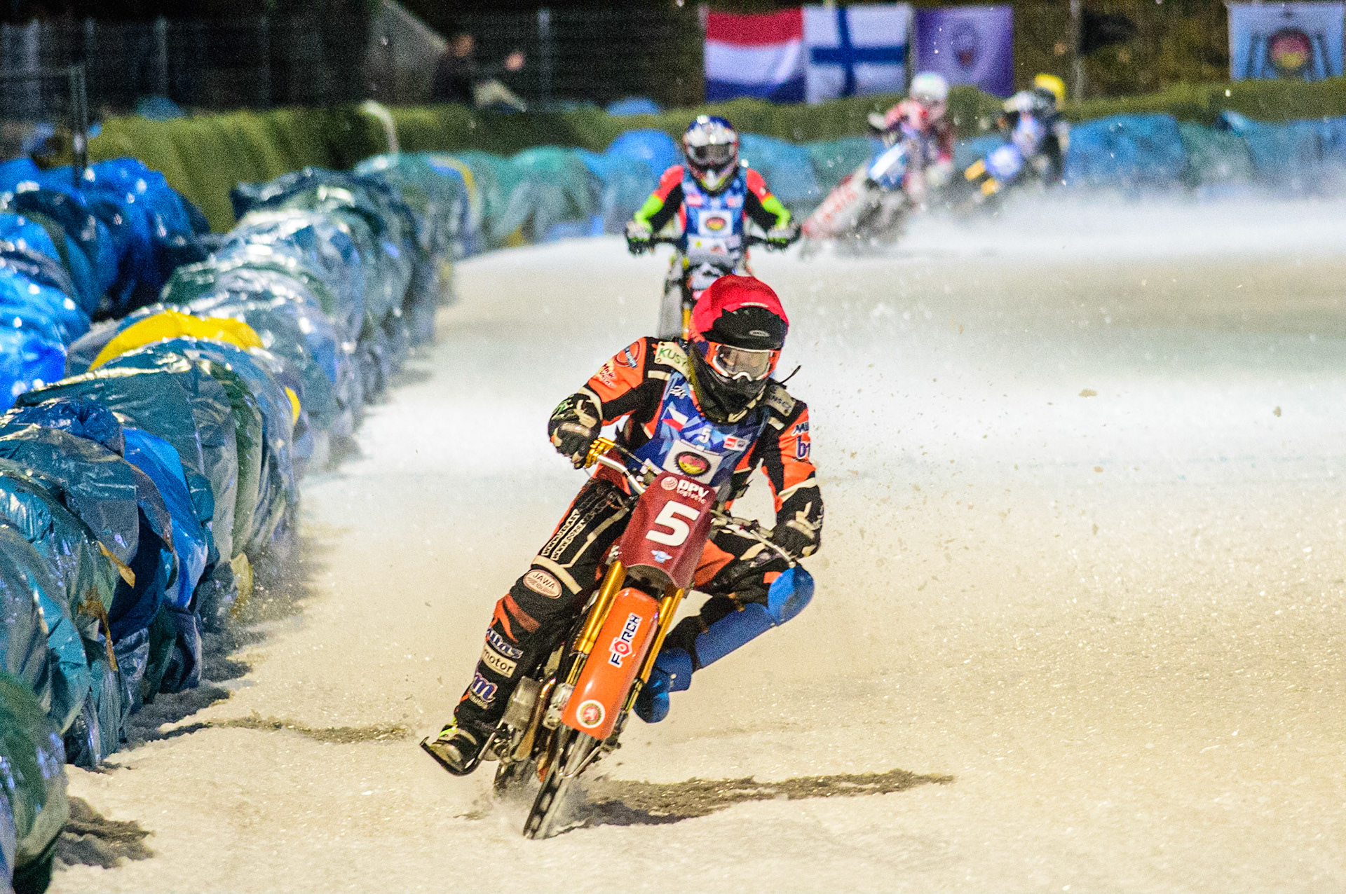 Lukas Hutla (Red) leads Harald Simon (Blue) during the German Individual Ice Speedway Championship at Horst-Dohm-Eisstadion, Berlin on Friday 3rd March 2023. (Photo: Ian Charles | MI News)