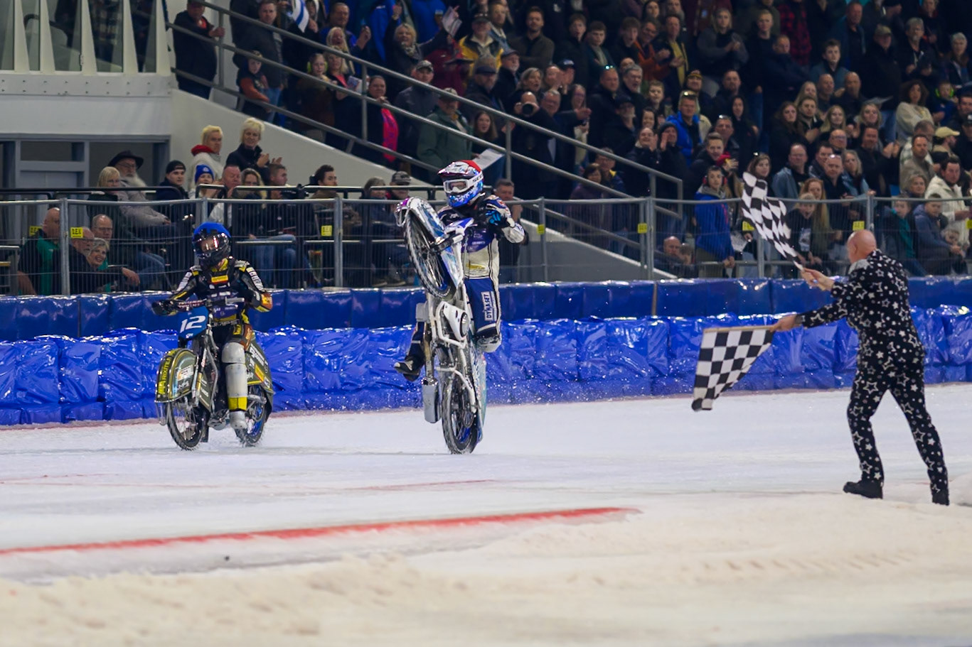 The Finnish riders celebrate qualifying for the Grand Final during the FIM Ice Speedway Of Nations at Ice Rink Thialf, Heerenveen on Sunday 12th April 2026. (Photo: Ian Charles | MI News)