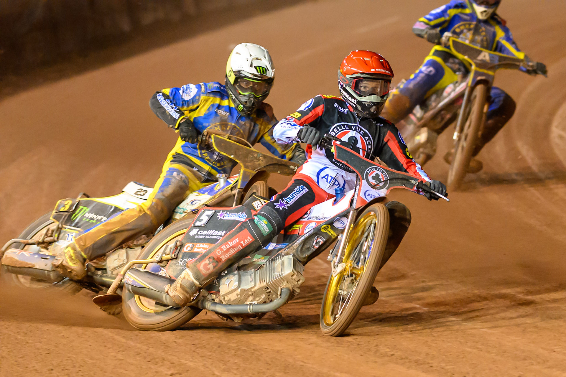 Jason Doyle of Belle Vue Aces in Red leading Chris Holder of Sheffield Tigers in White  and Leon Flint of Sheffield Tigers in Yellow during the Rowe Motor Oil Premiership Grand Final 2nd Leg between Belle Vue Aces and Sheffield Tigers at the National Speedway Stadium, Manchester on Friday 16th October 2026. (Photo: Ian Charles | MI News)