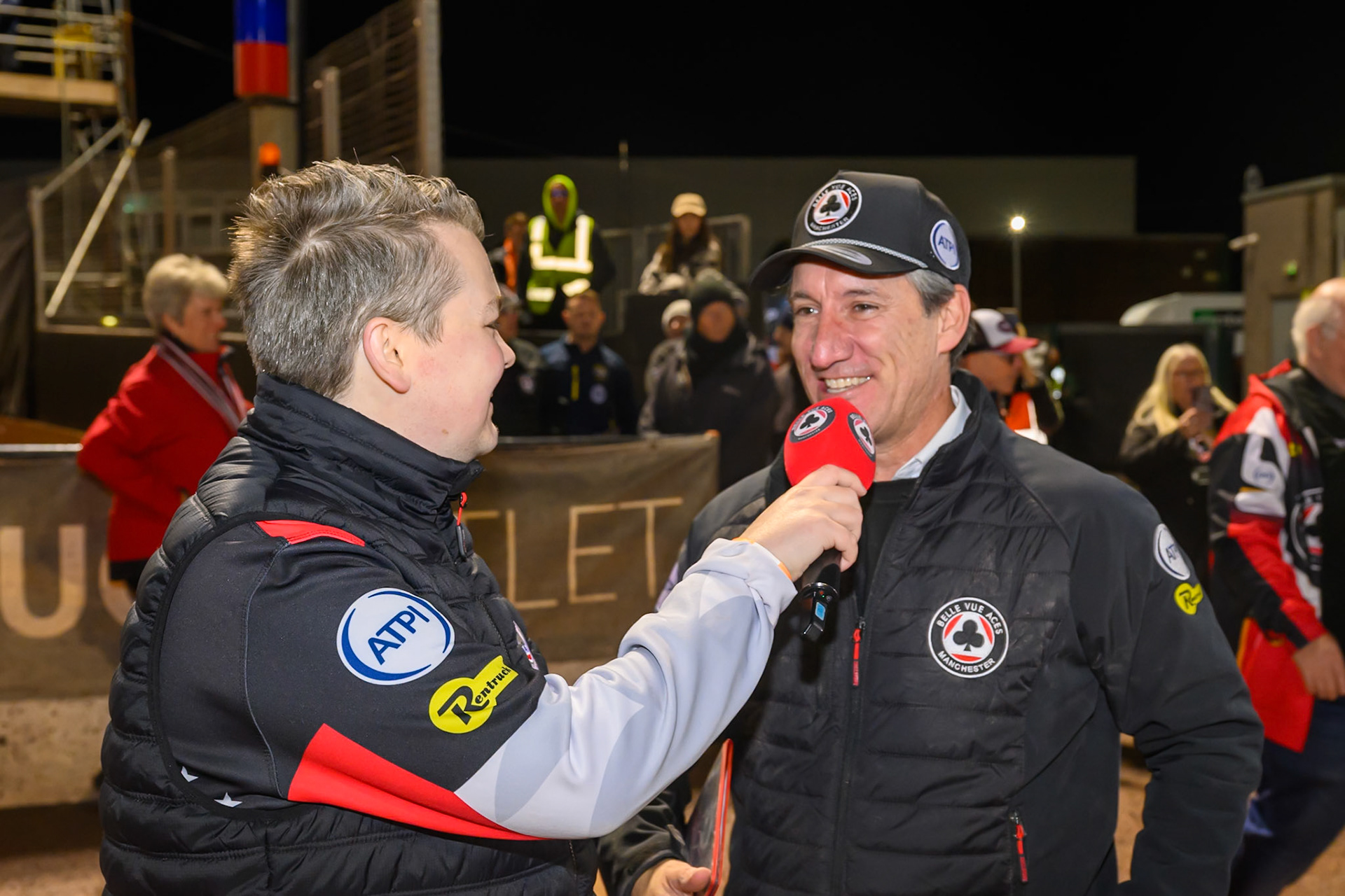 Belle Vue Presenter Lee Wild interviews an ecstatic Mark Lemon, Team Manager of Belle Vue Aces during the Rowe Motor Oil Premiership Grand Final 2nd Leg between Belle Vue Aces and Sheffield Tigers at the National Speedway Stadium, Manchester on Friday 16th October 2026. (Photo: Ian Charles | MI News)