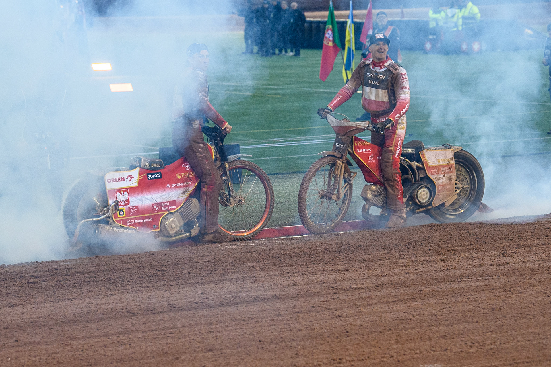 Polish riders do a celebratory burn out during the Monster Energy FIM Speedway of Nations 2 (Under 21) Final at the National Speedway Stadium, Manchester on Friday 12th July 2024. (Photo: Ian Charles | MI News)