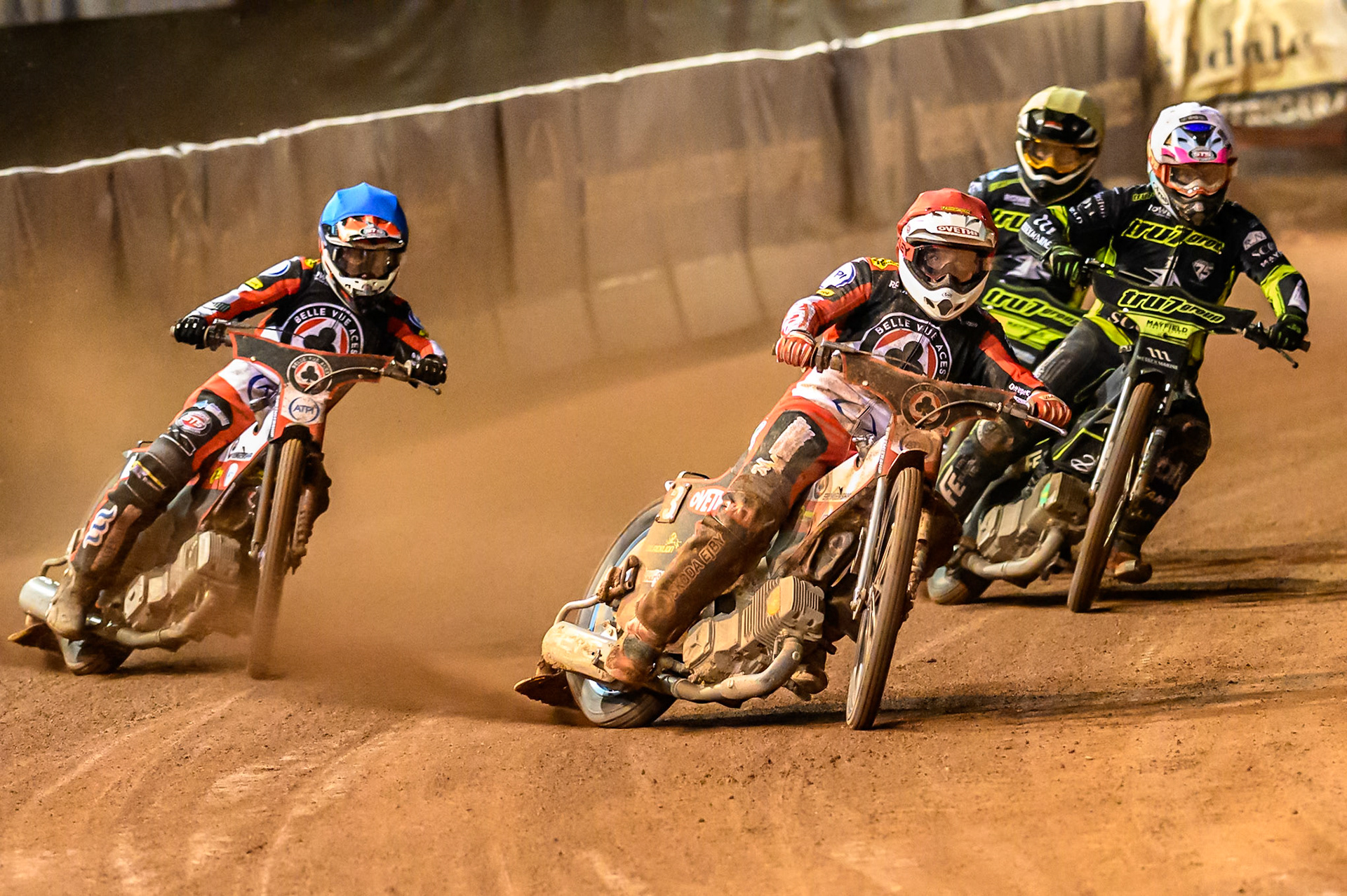 Peter Kildemand of Belle Vue Aces in Red  and Zach Cook of Belle Vue Aces in Blue  leading  Richard Lawson of Ipswich Witches in White  and Scott Nichols of Ipswich Witches in Yellow during the Rowe Motor Oil Premiership Play Off Semi Final 2nd leg match between Belle Vue Aces and Ipswich Witches at the National Speedway Stadium, Manchester on Monday 28th September 2026. (Photo: Ian Charles | MI News)