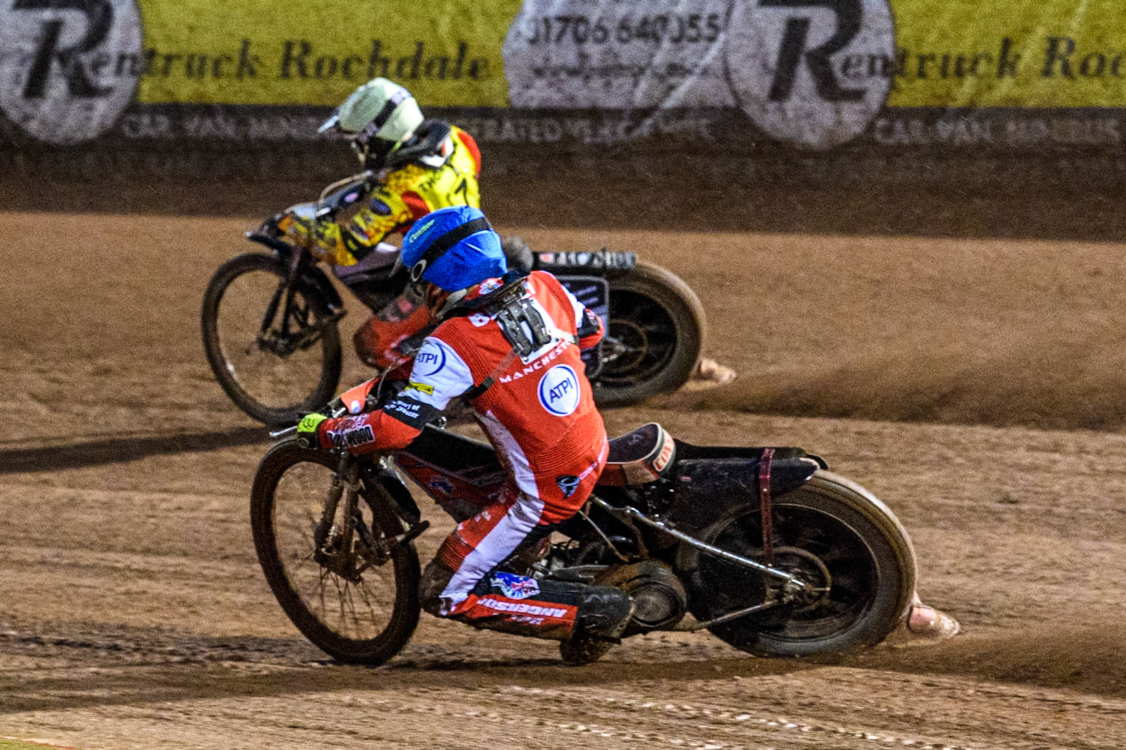 Connor Bailey of Belle Vue Aces in Blue chases \l;ly\ in Yellow during the Rowe Motor Oil Premiership match between Belle Vue Aces and Leicester Lions at the National Speedway Stadium, Manchester on Saturday 6th April 2024. (Photo: Ian Charles | MI News)