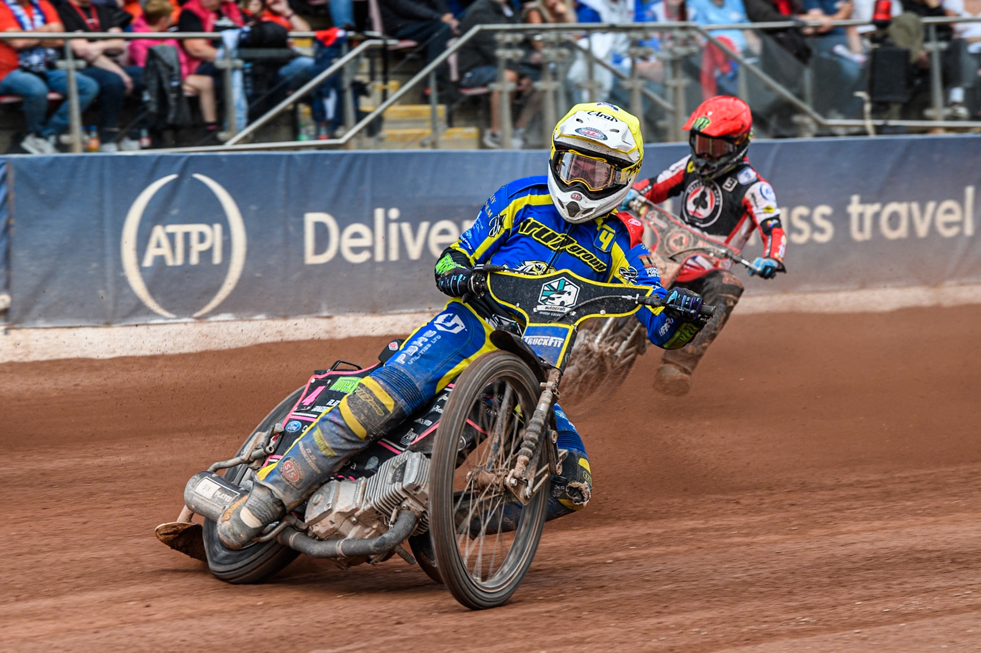 Sheffield Tigers' Josh Pickering in Yellow leading Belle Vue Aces' Jaimon Lidsey  in Red  during the Rowe Motor Oil Premiership match between Belle Vue Aces and Sheffield Tigers at the National Speedway Stadium, Manchester on Monday 26th August 2024. (Photo: Ian Charles | MI News)
