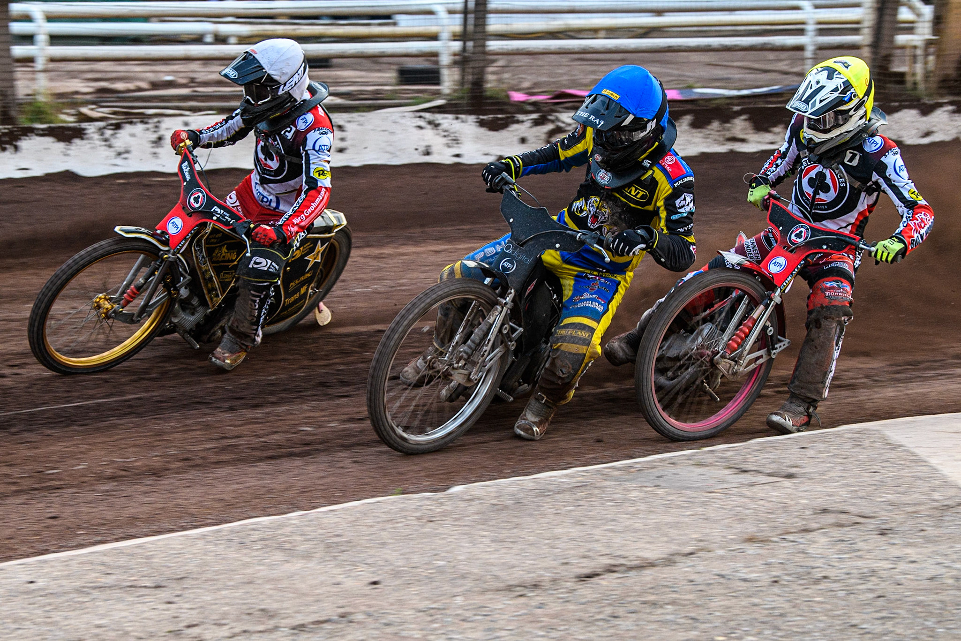 (l - r) - Norick Blodorn (White), Dan Gilkes (Blue) and Connor Bailey (Yellow) during the Sports Insure Premiership match between Sheffield Tigers and Belle Vue Aces at Owlerton Stadium, Sheffield on Thursday 20th July 2023. (Photo: Ian Charles | MI News)