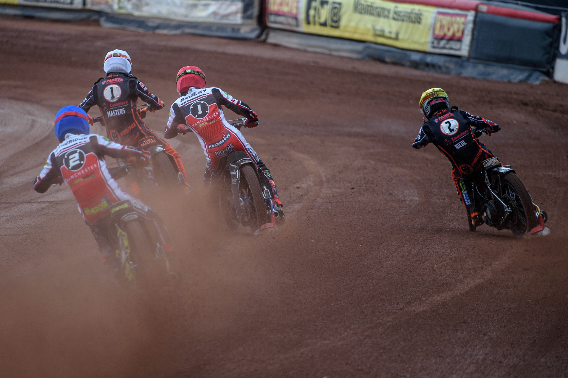 MANCHESTER, UK. AUGUST 30TH Jye Etheridge  (Blue) chases Dan Bewley  (Red) Broc Nicol  (Yellow) and Sam Masters  (White) during the SGB Premiership match between Belle Vue Aces and Wolverhampton Wolves at the National Speedway Stadium, Manchester on Monday 30th August 2021. (Credit: Ian Charles | MI News)