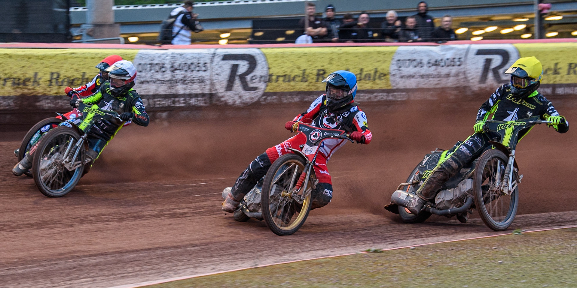 Belle Vue Aces' Norick Blodorn  in Blue leading Ipswich Witches' Adam Ellis in Yellow, Ipswich Witches' Danny King in White and Belle Vue Aces' Brady Kurtz  in Red during the Rowe Motor Oil Premiership match between Belle Vue Aces and Ipswich Witches at the National Speedway Stadium, Manchester on Monday 1st July 2024. (Photo: Ian Charles | MI News)