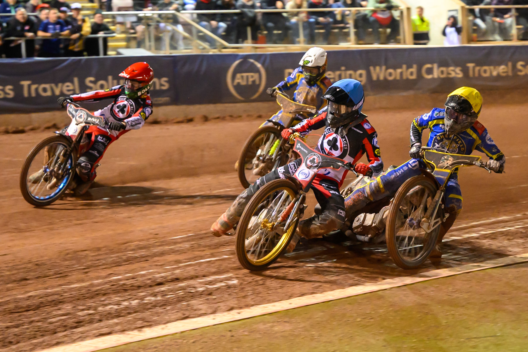 Norick Blodorn of Belle Vue Aces in Blue on the inside of Brady Kurtz of Belle Vue Aces  in Red  with Luke Killeen of Sheffield Tigers in Yellow  and Chris Holder of Sheffield Tigers in White  behind during the Rowe Motor Oil Premiership Grand Final 2nd Leg between Belle Vue Aces and Sheffield Tigers at the National Speedway Stadium, Manchester on Friday 16th October 2026. (Photo: Ian Charles | MI News)