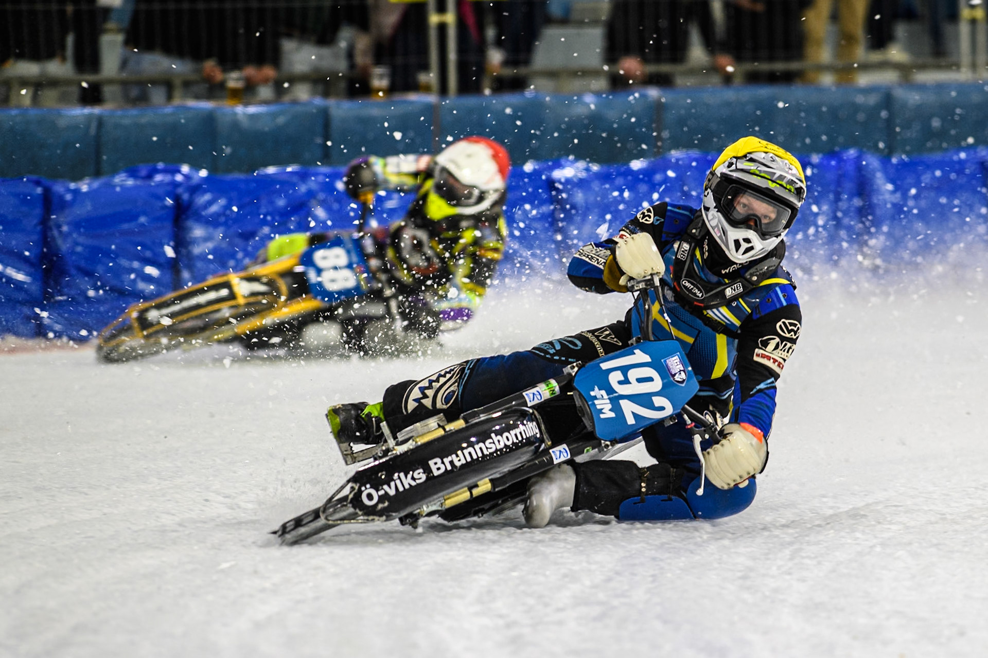 Niclas Svensson (192) of Sweden in Yellow leading Max Niedermaier  (88) of Germany in Red during the FIM Ice Speedway Gladiators World Championship, Final 3 at the Ice Stadium, Thialf, Heerenveen on Saturday 5th April 2025. (Photo: Ian Charles | MI News)