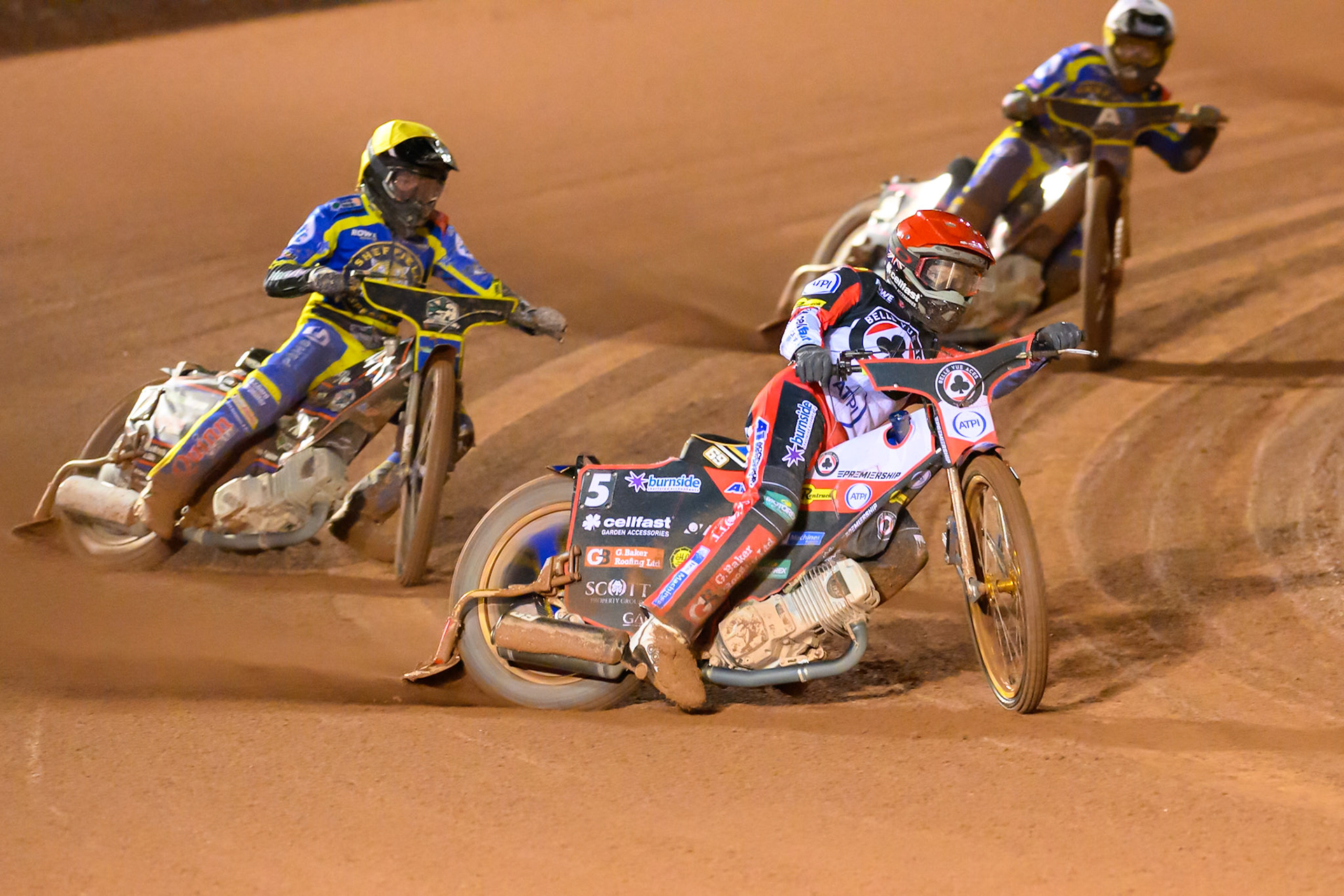 Jason Doyle of Belle Vue Aces in Red leading Luke Killeen of Sheffield Tigers in Yellow  and Josh Pickering of Sheffield Tigers in White  during the Rowe Motor Oil Premiership Grand Final 2nd Leg between Belle Vue Aces and Sheffield Tigers at the National Speedway Stadium, Manchester on Friday 16th October 2026. (Photo: Ian Charles | MI News)