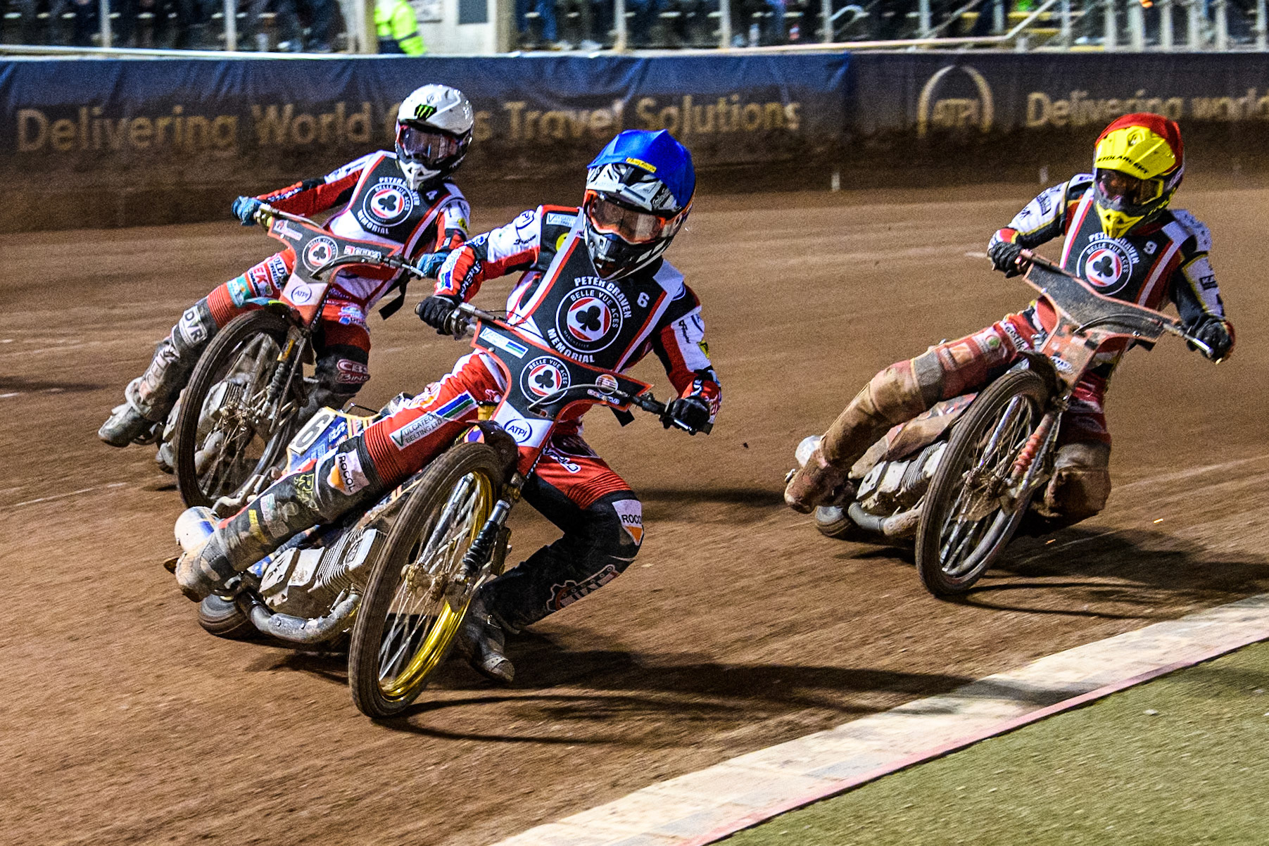 England's Connor Mountain (Blue) leads  Poland's Patryk Wojdylo (Red) and Australia's Jaimon Lidsey (White) during the Peter Craven Memorial Trophy meeting at the National Speedway Stadium, Manchester on Monday 18th March 2024. (Photo: Ian Charles | MI News)