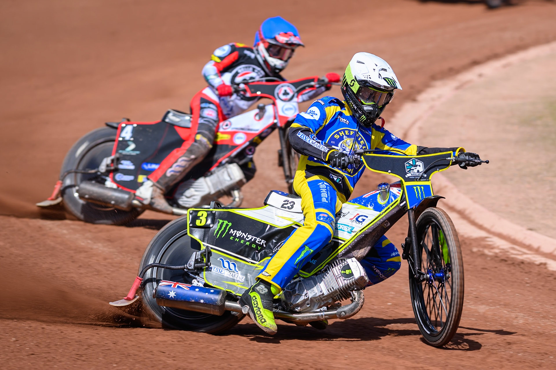 Chris Holder of Sheffield Tigers in White leading Zach Cook of Belle Vue Aces in Blue during the Rowe Motor Oil Premiership match between Belle Vue Aces and Sheffield Tigers at the National Speedway Stadium, Manchester on Monday 25th May 2026. (Photo: Ian Charles | MI News)