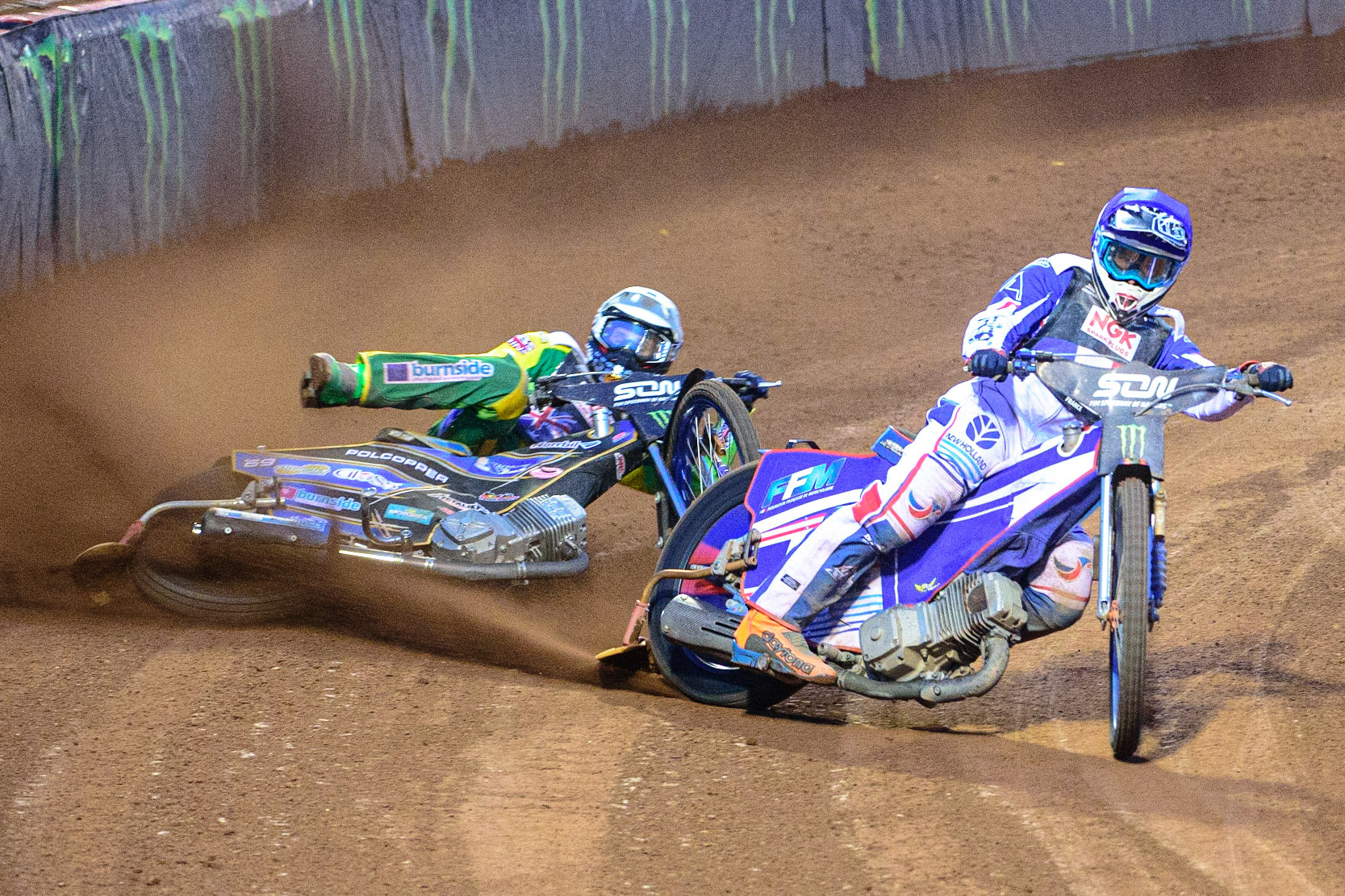 MANCHESTER, UK. OCT 16TH Jason Doyle of Australia (White) locks up behind Dmitri Berge of France (Blue) during the Monster Energy FIM Speedway of Nations at the National Speedway Stadium, Manchester on Saturday  16th October 2021. (Credit: Ian Charles | MI News)