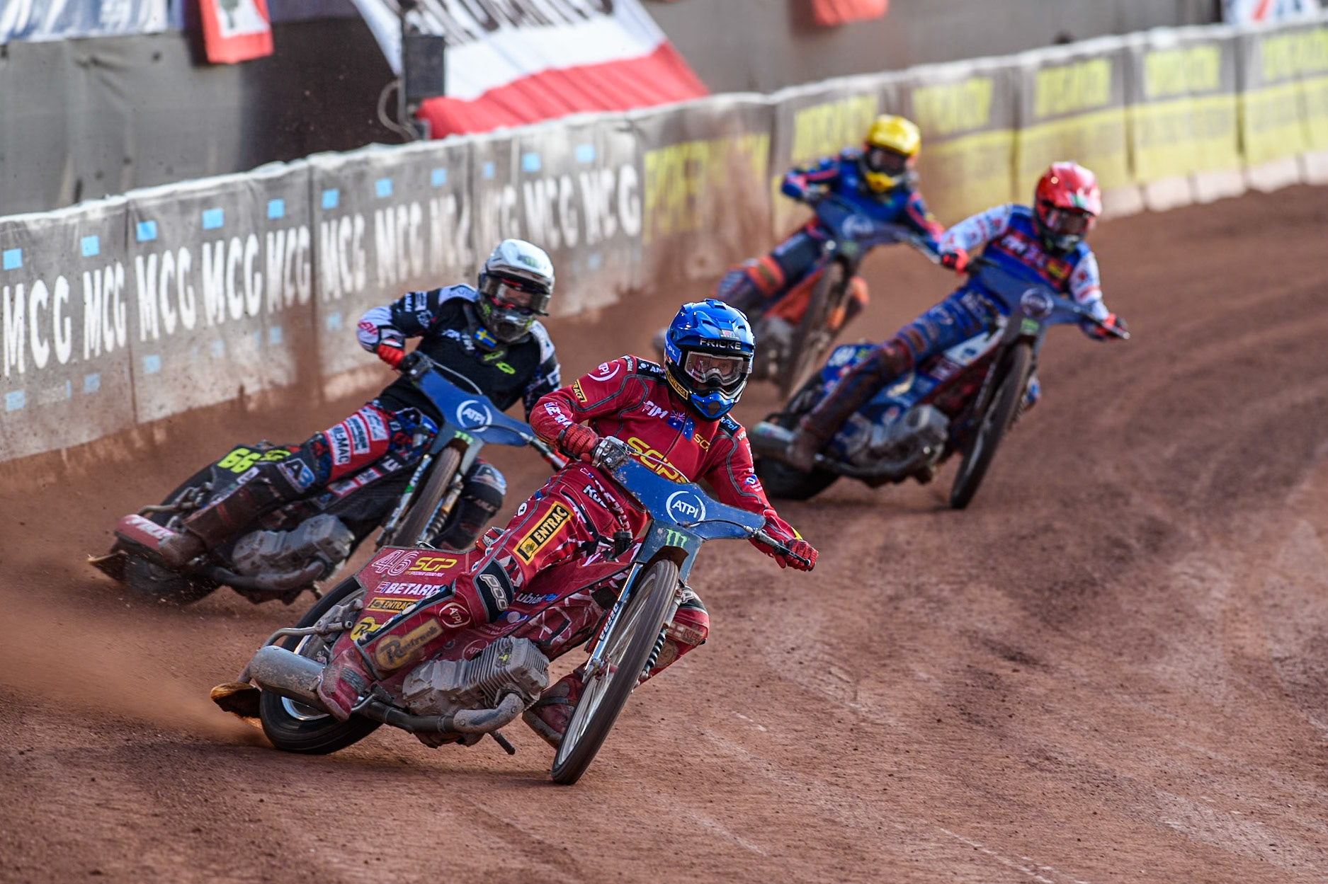 Max Fricke (46) of Australia in Blue leading Fredrik Lindgren (66) of Sweden in White Dan Bewley (99) of Great Britain in Red and Andzejs Lebedevs (29) of Latvia in Yellow during the ATPI FIM Speedway Grand Prix Round 5 at the National Speedway Stadium, Manchester, on Saturday 14th June 2025. (Photo: Ian Charles | MI News)