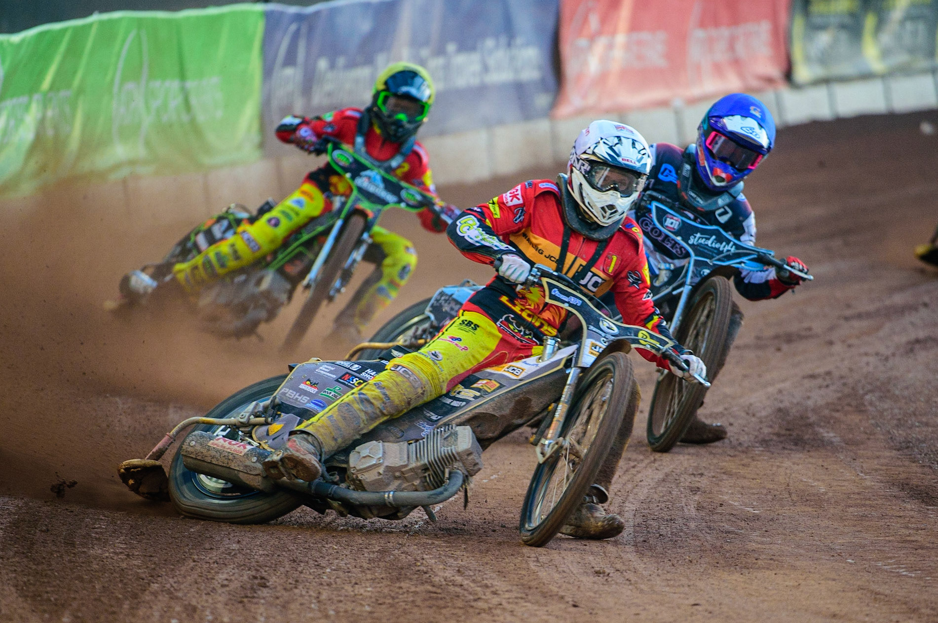 Dan Thompson   (White) leads Freddy Hodder (Blue) and Max Perry  (Yellow) during the National Development League match between Belle Vue Aces and Leicester Lions at the National Speedway Stadium, Manchester on Friday 19th August 2022. (Credit: Ian Charles | MI News)
