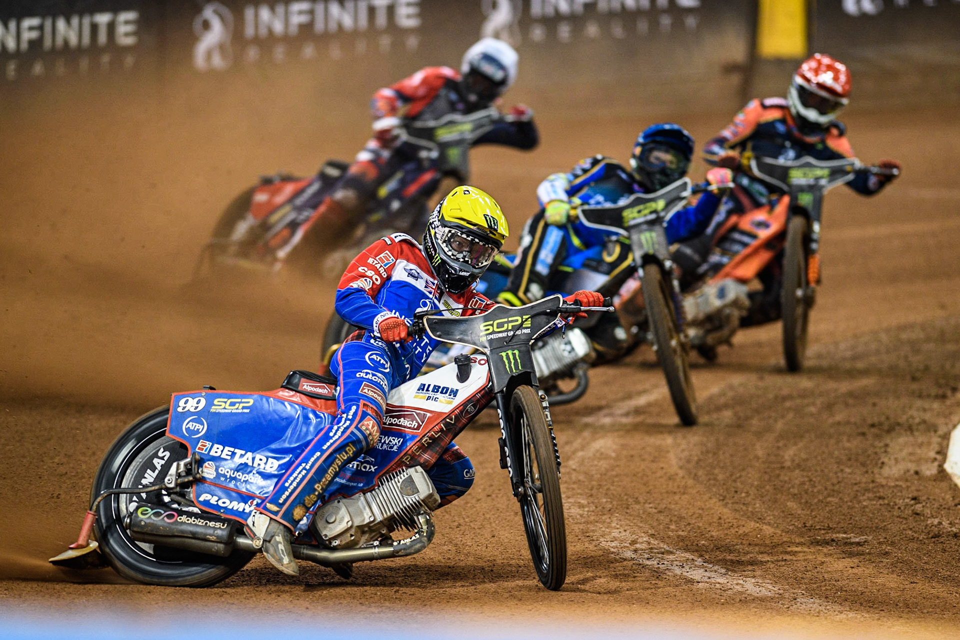 Dan Bewley (99) (Yellow) leads  Jason Doyle (69) (Blue) Mikkel Michelsen (155) (Red) and Wild Card rider Steve Worrall (16) (White) during the FIM Speedway Grand Prix of Great Britain at the Principality Stadium, Cardiff on Saturday 2nd September 2023. (Photo: Ian Charles | MI News)