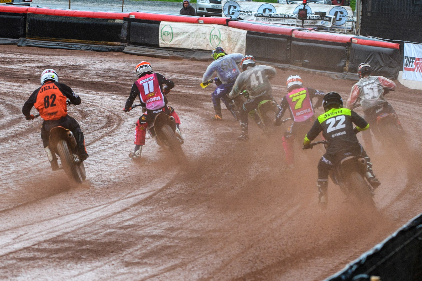 The riders battle the rain in the opening heat during the FIM World Flat Track Championship Round 1 at the National Speedway Stadium, Manchester on Saturday 5th August 2023. (Photo: Ian Charles | MI News)